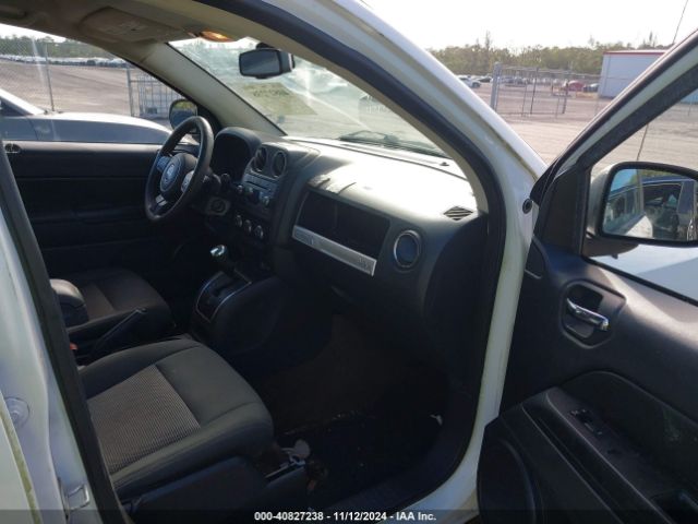 Photo 4 VIN: 1C4NJCBA4GD609329 - JEEP COMPASS 