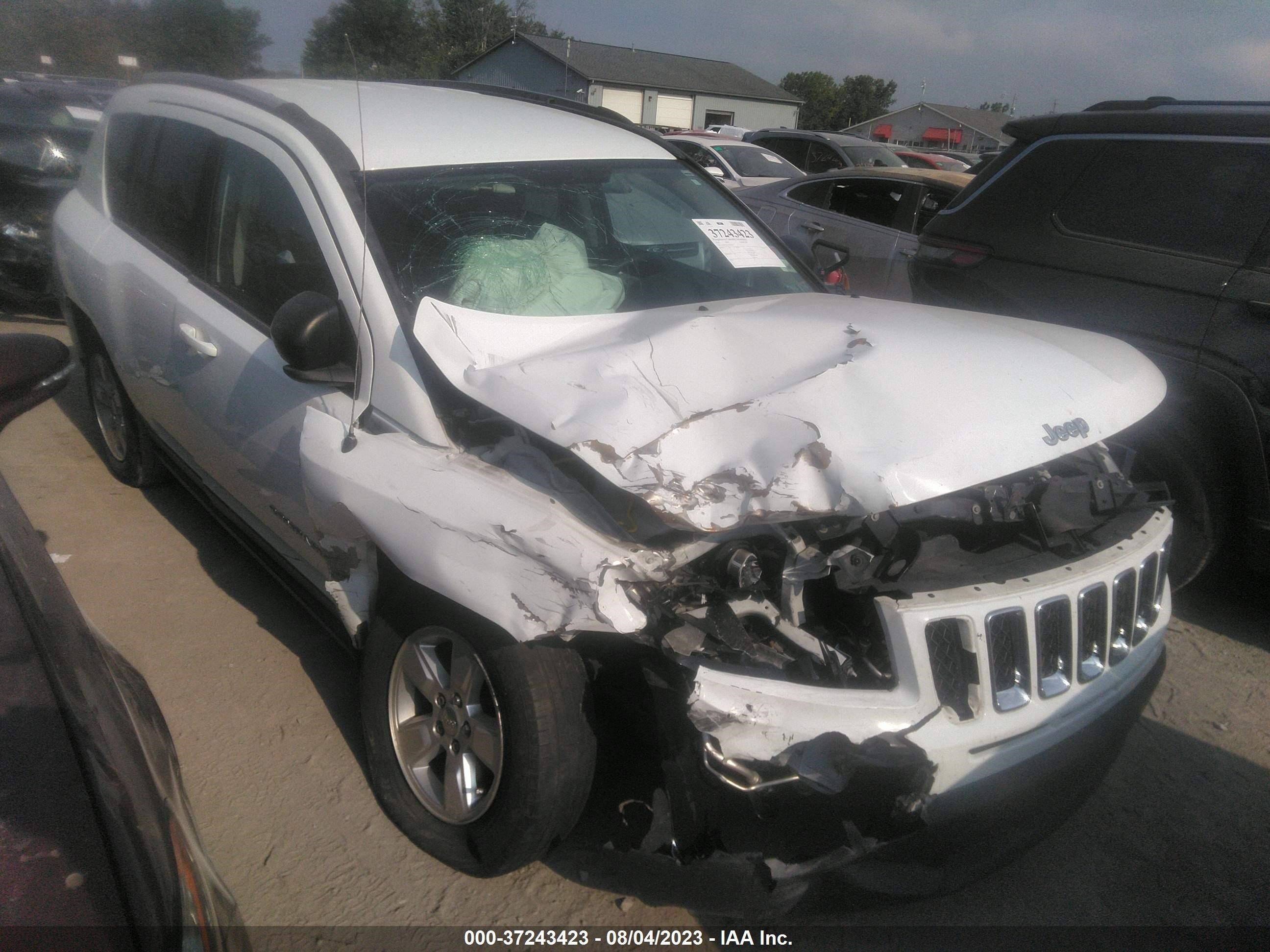 Photo 5 VIN: 1C4NJCBA5GD656465 - JEEP COMPASS 