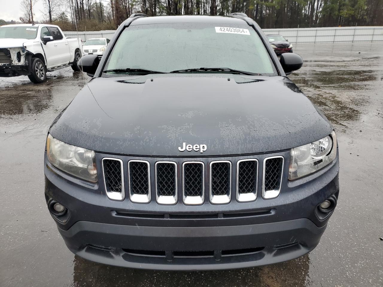 Photo 4 VIN: 1C4NJCBA6GD568623 - JEEP COMPASS 