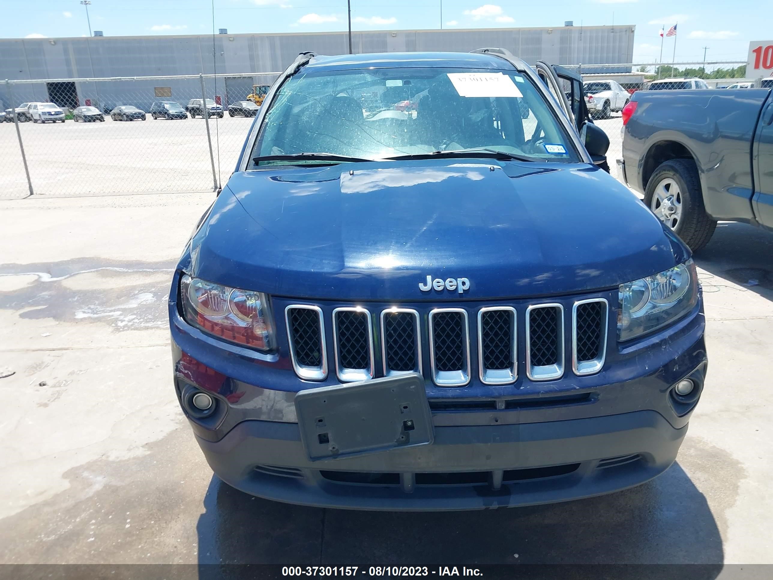 Photo 12 VIN: 1C4NJCBA8GD742787 - JEEP COMPASS 