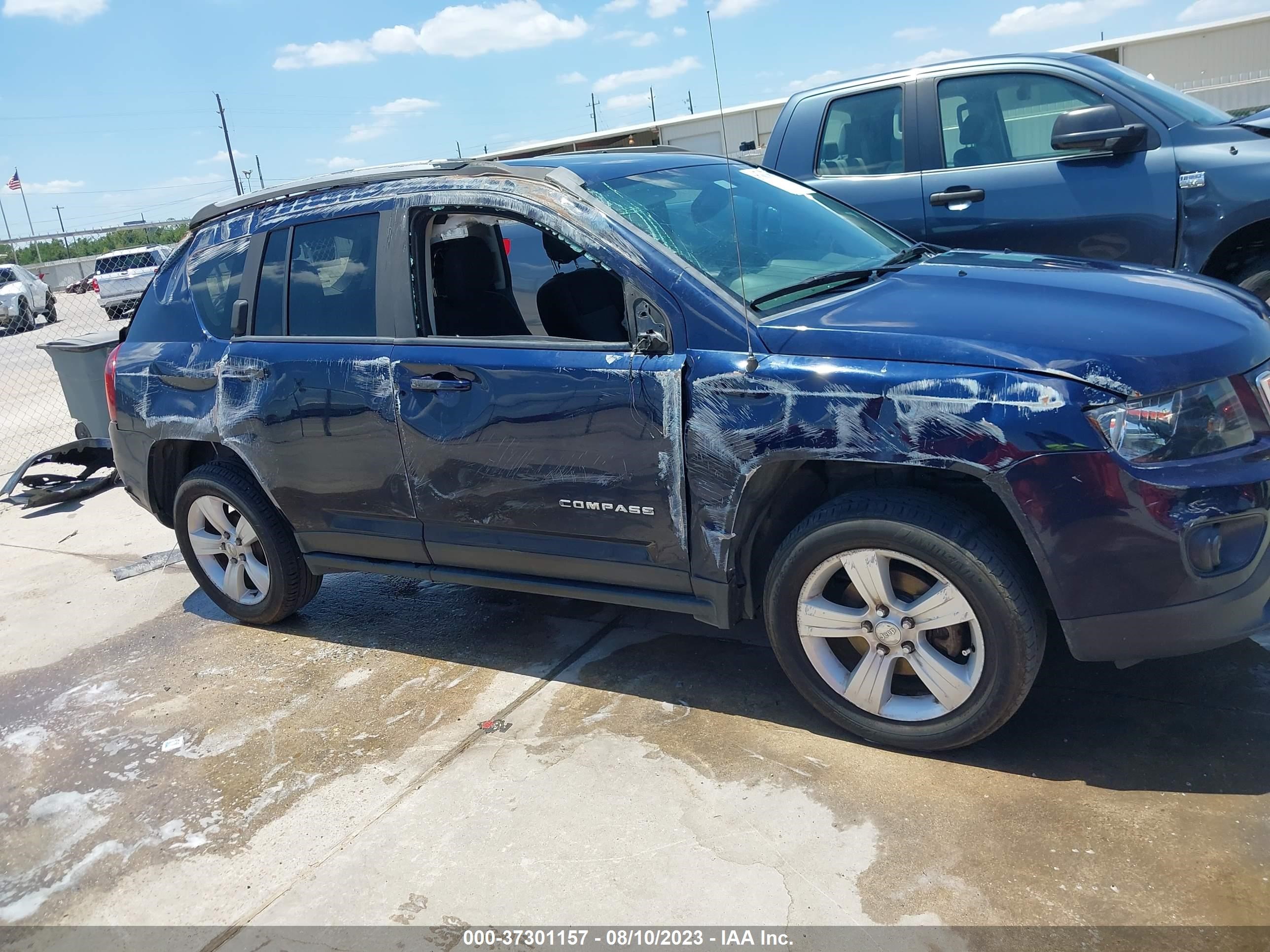 Photo 13 VIN: 1C4NJCBA8GD742787 - JEEP COMPASS 