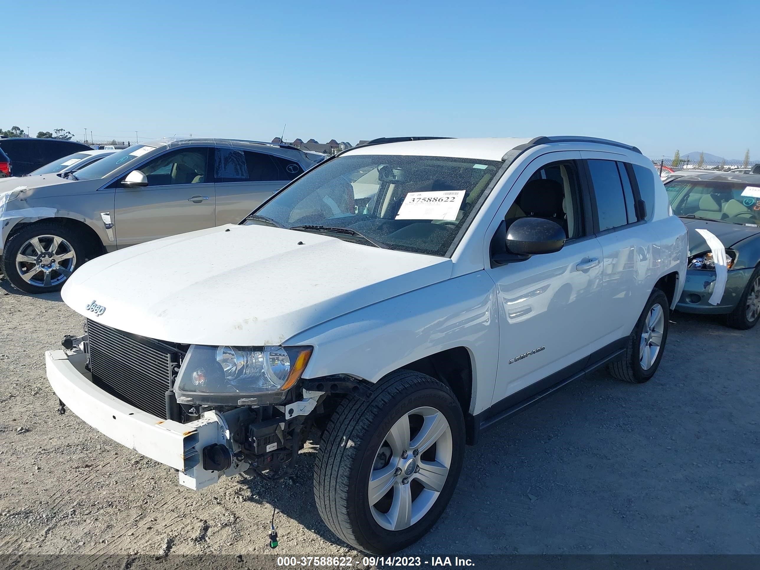 Photo 1 VIN: 1C4NJCBA9GD560516 - JEEP COMPASS 