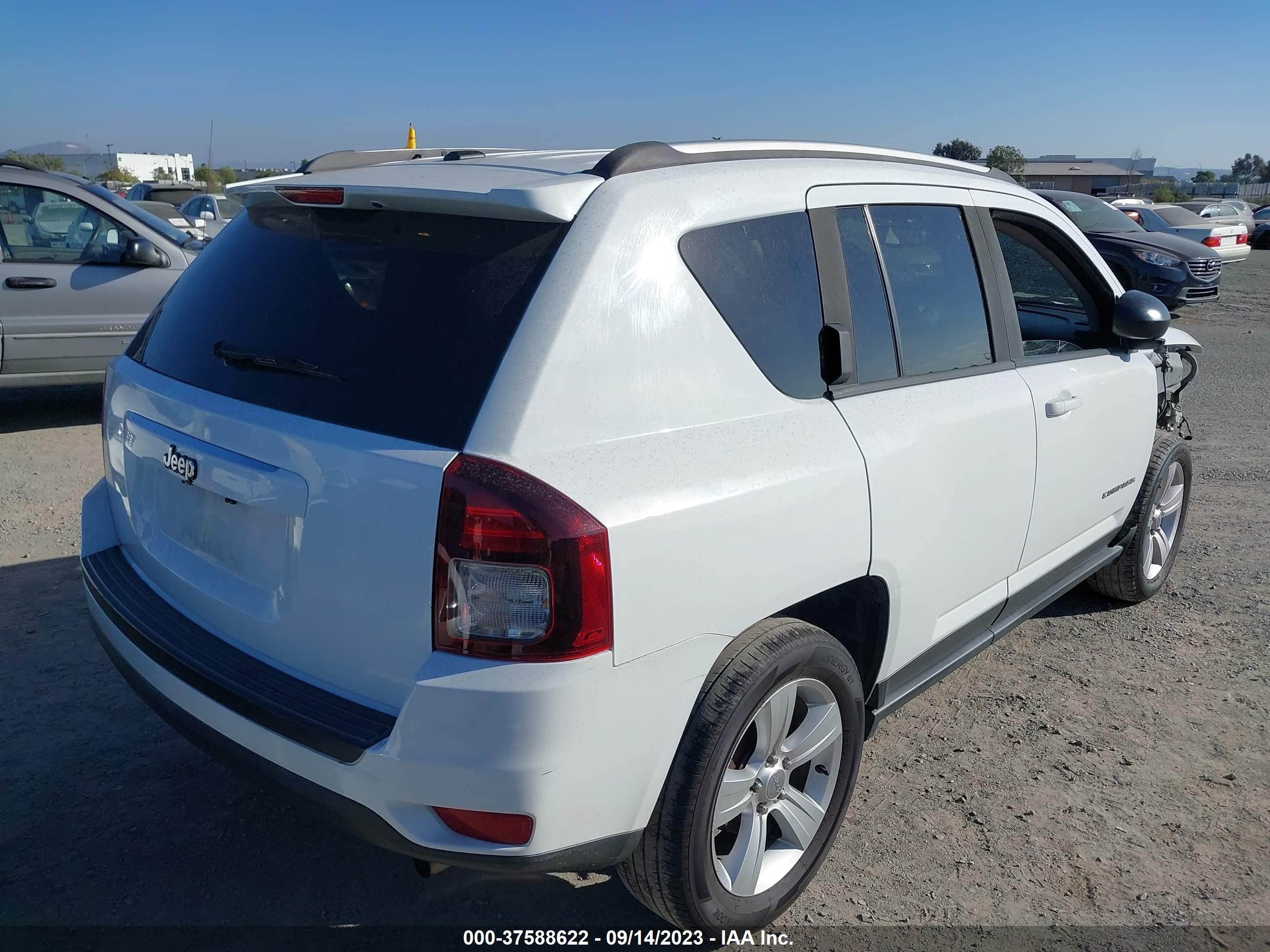 Photo 3 VIN: 1C4NJCBA9GD560516 - JEEP COMPASS 