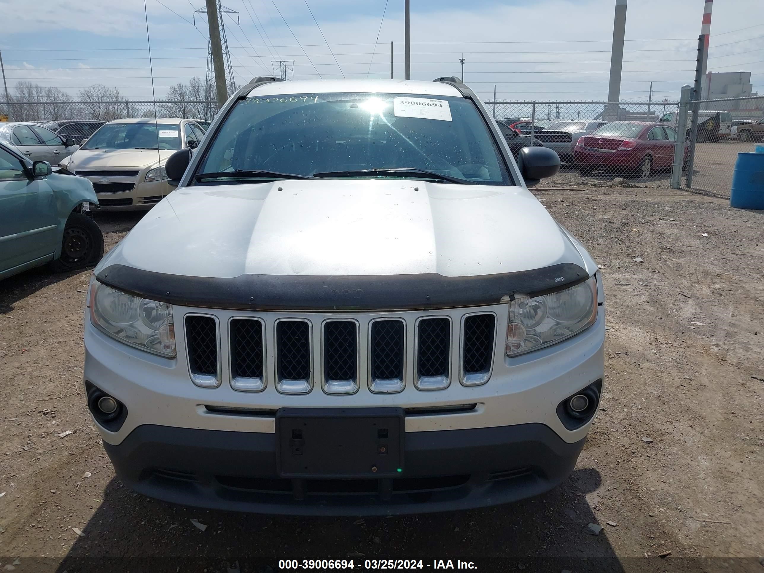 Photo 11 VIN: 1C4NJCBB7CD580363 - JEEP COMPASS 