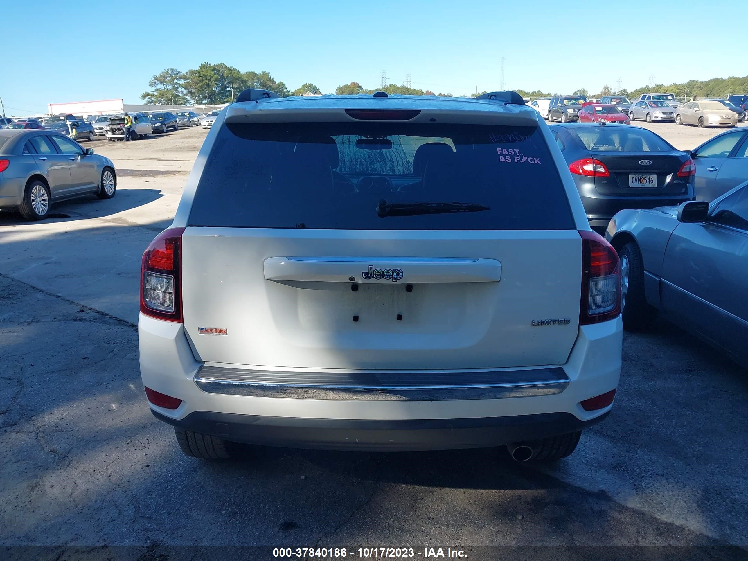 Photo 11 VIN: 1C4NJCCB4ED620769 - JEEP COMPASS 