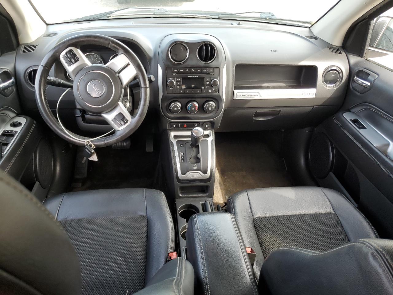 Photo 7 VIN: 1C4NJCEA5GD698193 - JEEP COMPASS 