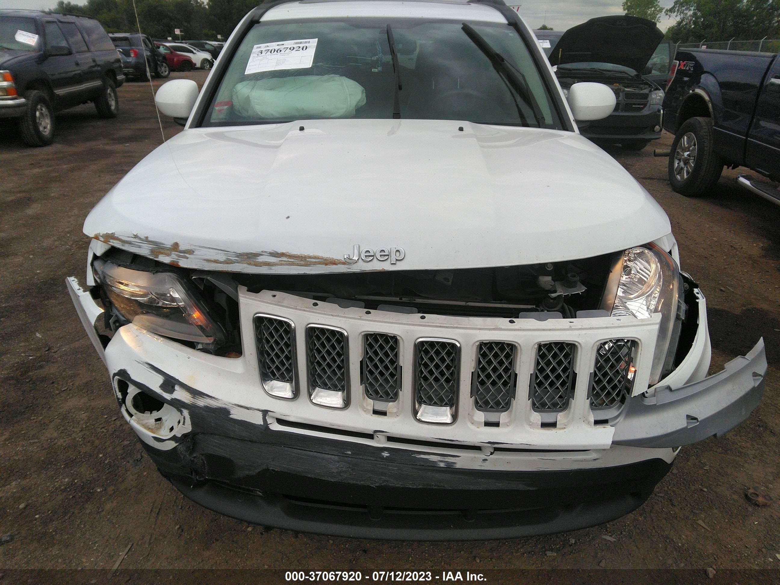 Photo 12 VIN: 1C4NJCEB0HD199005 - JEEP COMPASS 