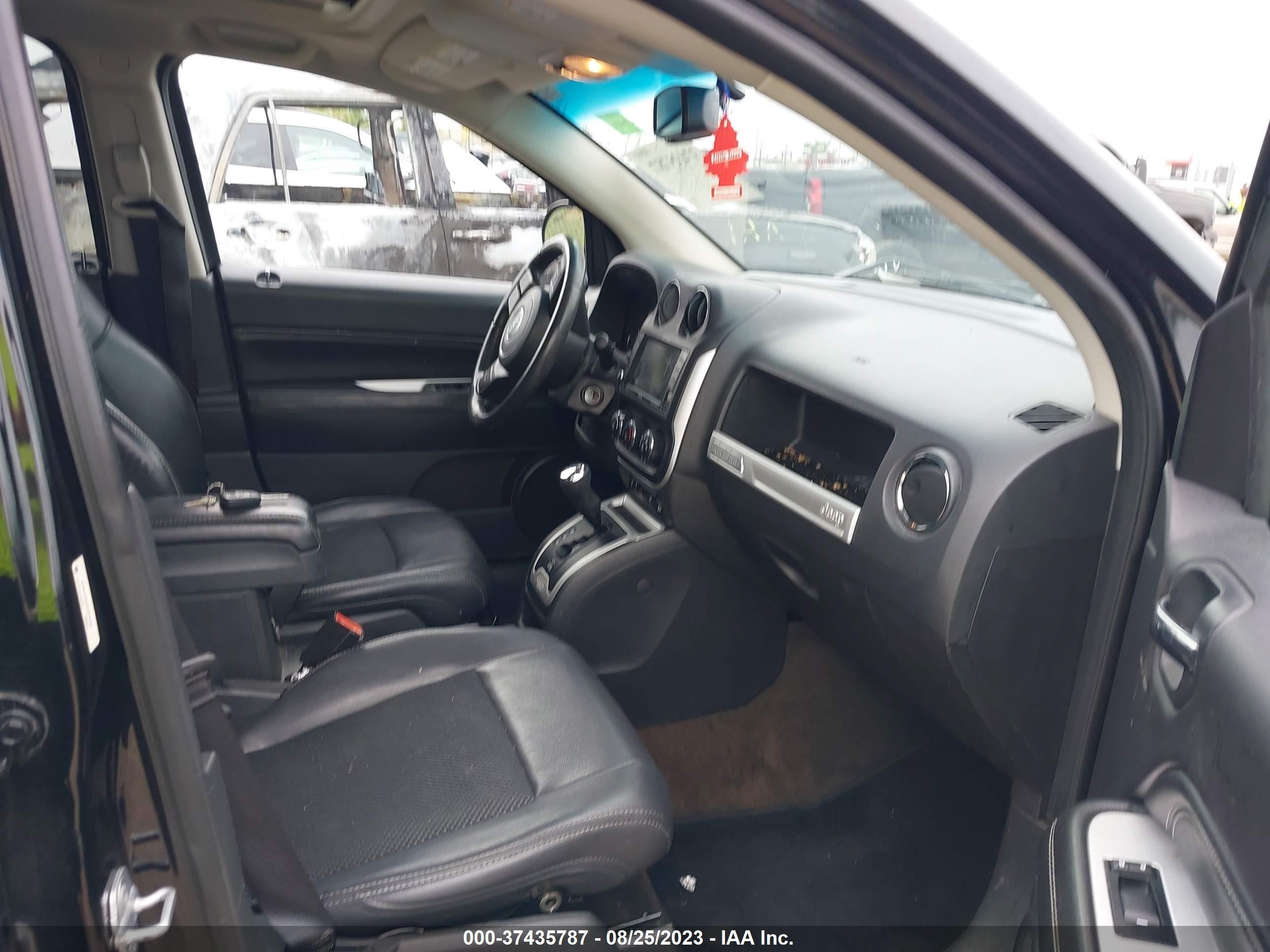 Photo 4 VIN: 1C4NJCEBXED628369 - JEEP COMPASS 