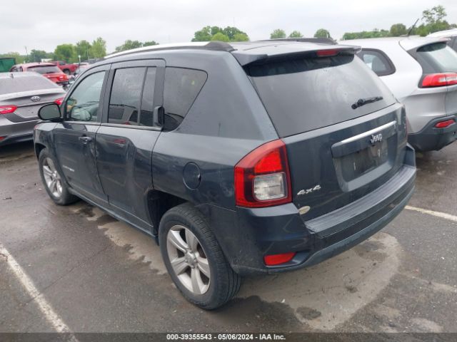 Photo 2 VIN: 1C4NJDBB8ED569431 - JEEP GRAND CHEROKEE 