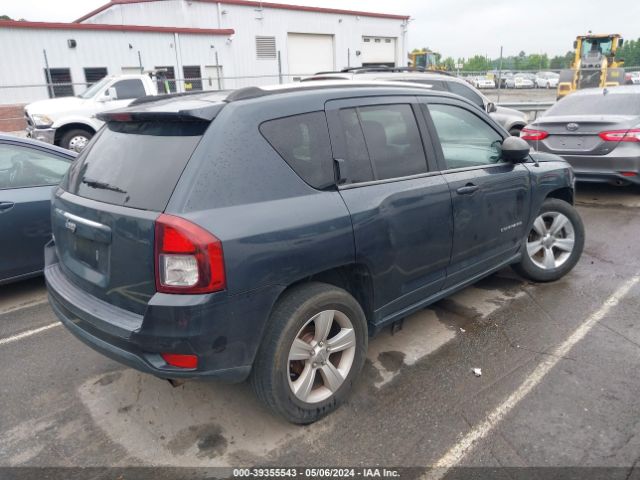 Photo 3 VIN: 1C4NJDBB8ED569431 - JEEP GRAND CHEROKEE 