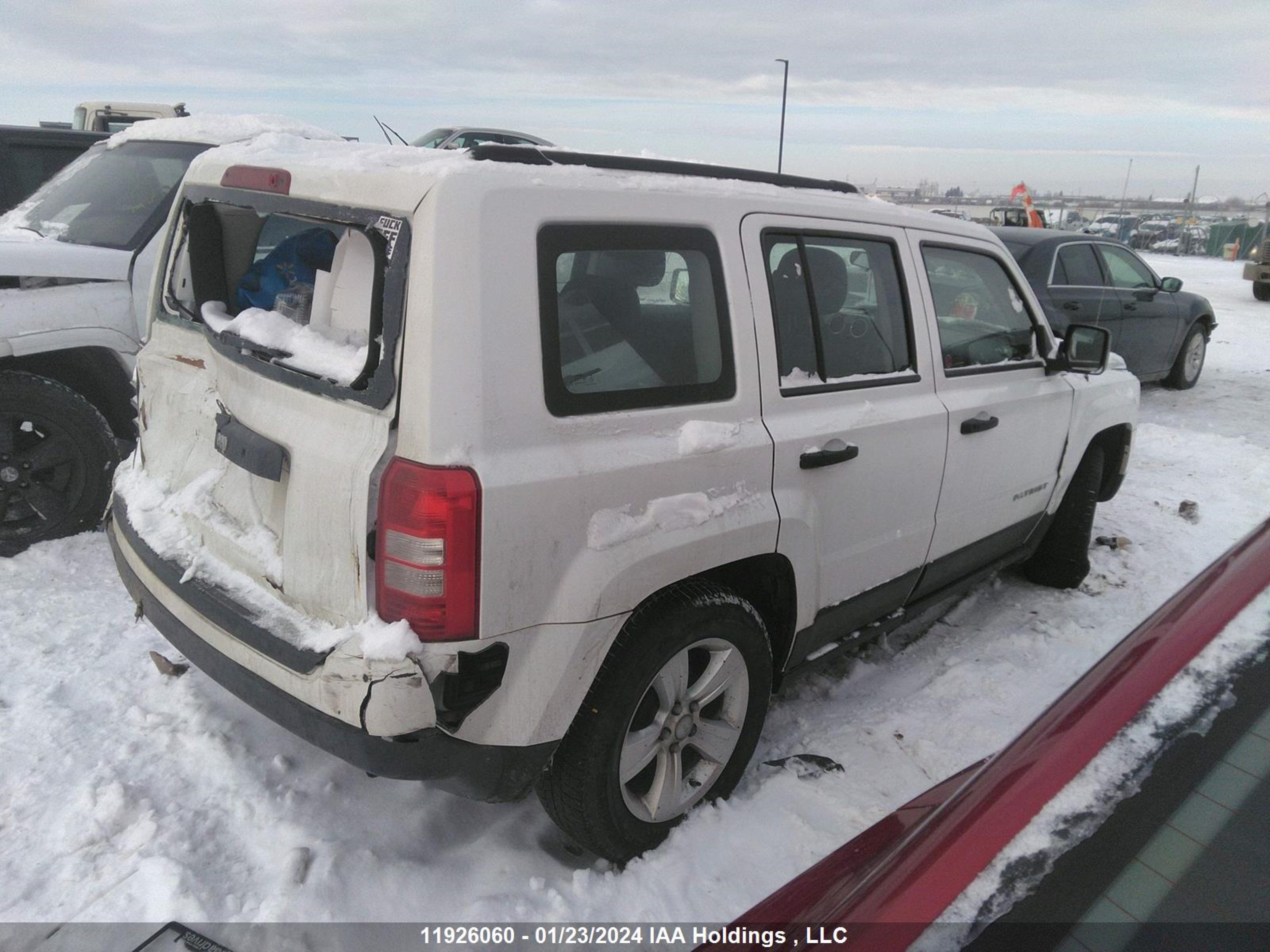 Photo 3 VIN: 1C4NJPAB5ED653547 - JEEP LIBERTY (PATRIOT) 