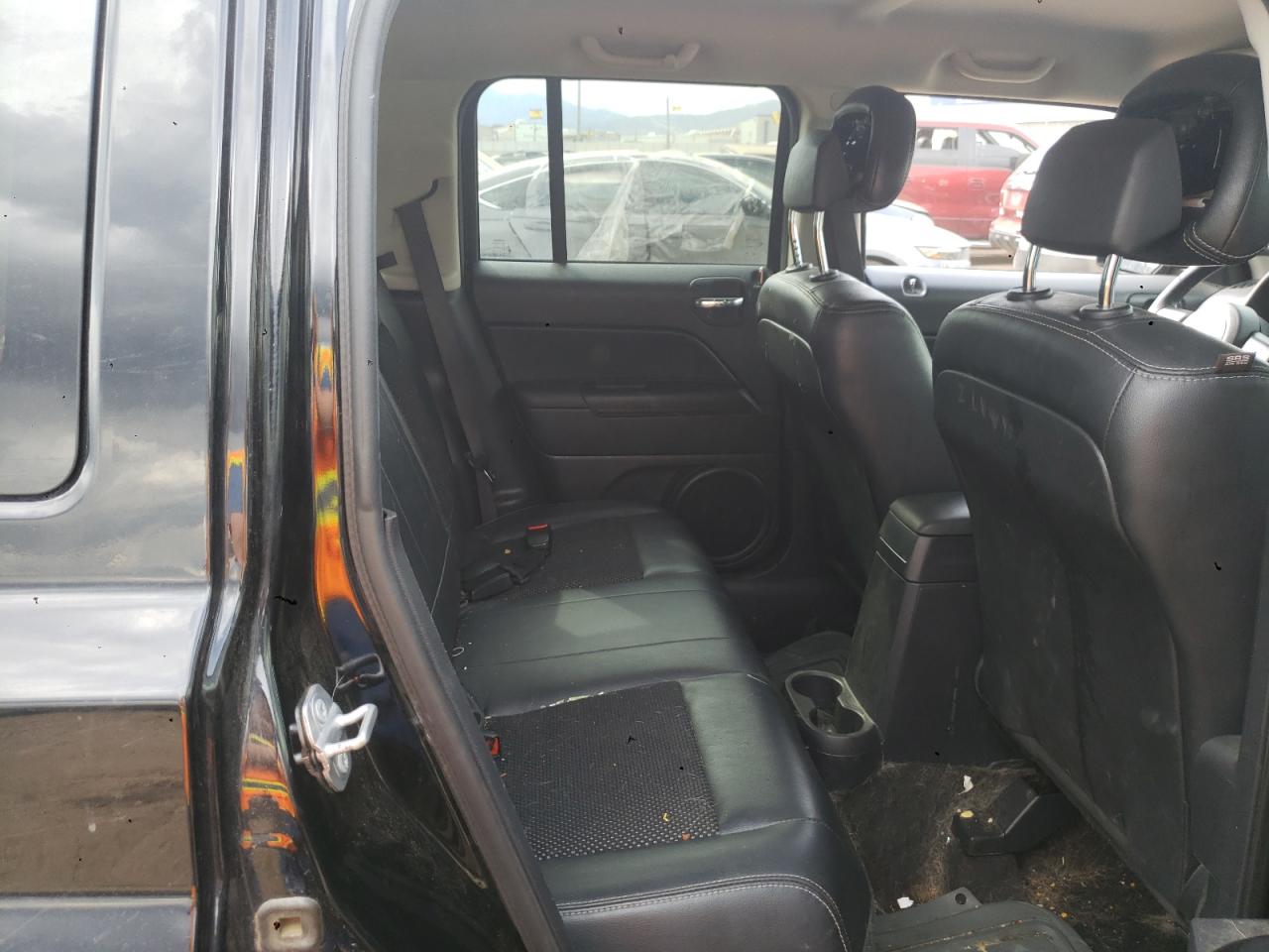 Photo 10 VIN: 1C4NJPBA0GD601557 - JEEP LIBERTY (PATRIOT) 