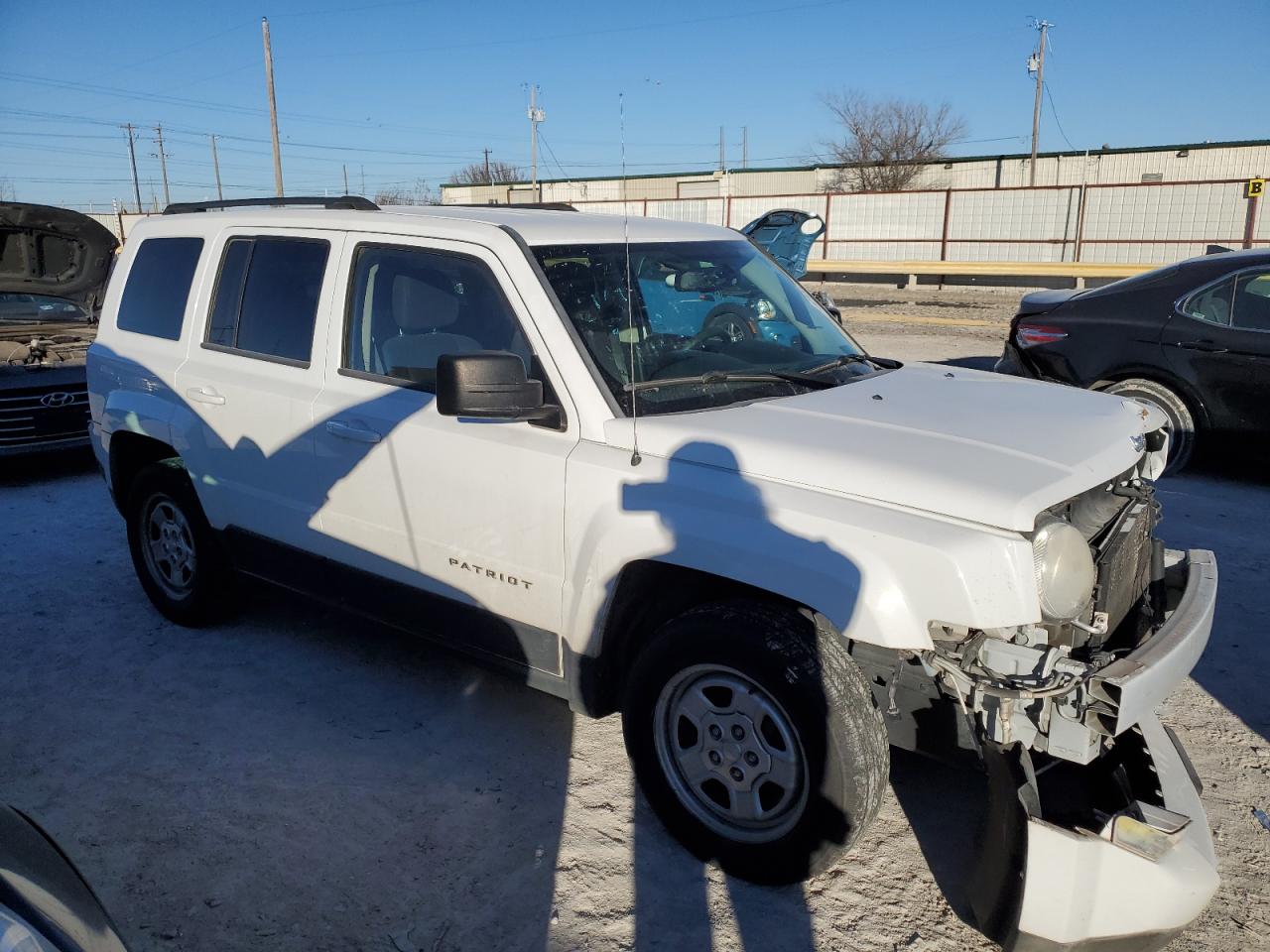 Photo 3 VIN: 1C4NJPBAXED692513 - JEEP LIBERTY (PATRIOT) 