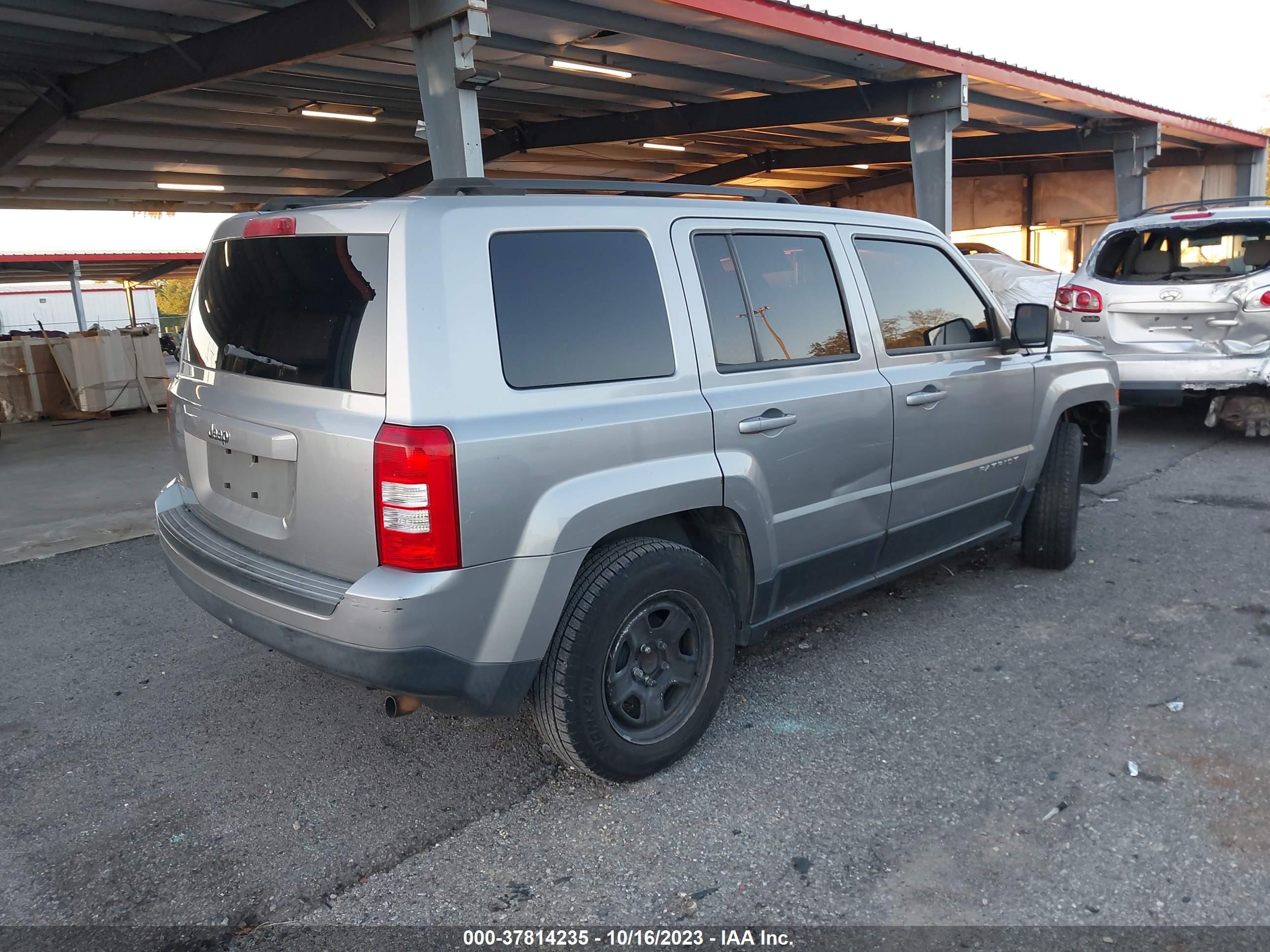 Photo 3 VIN: 1C4NJPBB0ED900147 - JEEP LIBERTY (PATRIOT) 