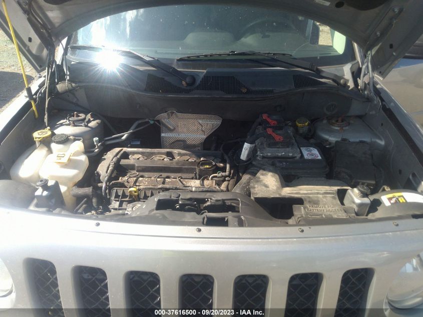 Photo 9 VIN: 1C4NJPBB0ED909446 - JEEP LIBERTY (PATRIOT) 