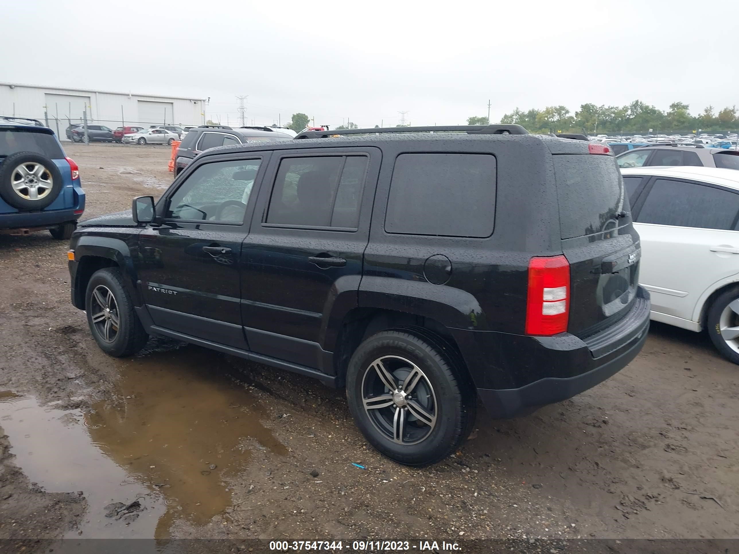 Photo 2 VIN: 1C4NJPBB1GD807978 - JEEP LIBERTY (PATRIOT) 