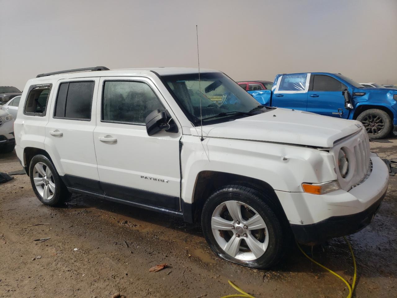 Photo 3 VIN: 1C4NJPBB5ED660707 - JEEP LIBERTY (PATRIOT) 