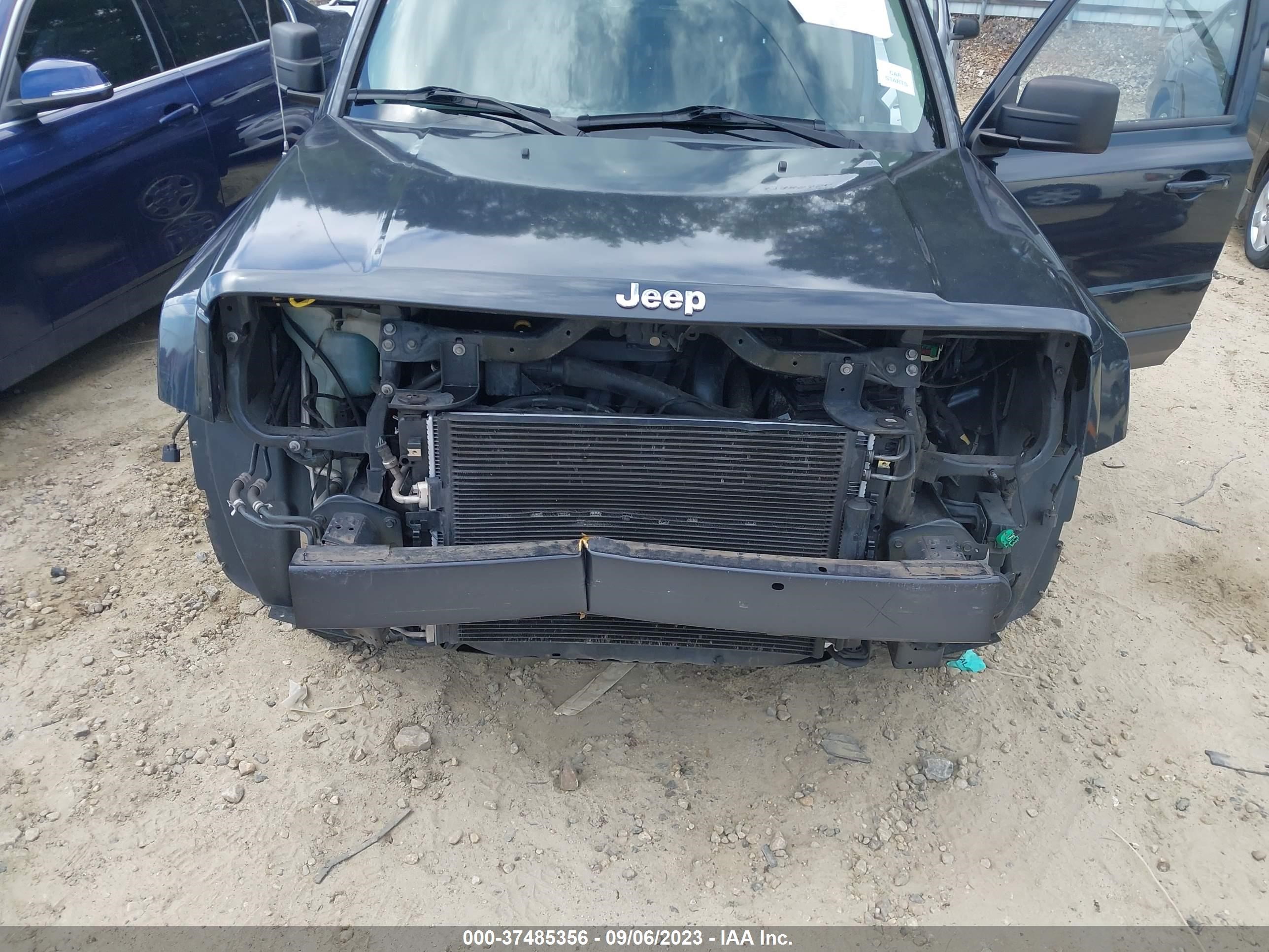 Photo 5 VIN: 1C4NJPBB5ED894071 - JEEP LIBERTY (PATRIOT) 