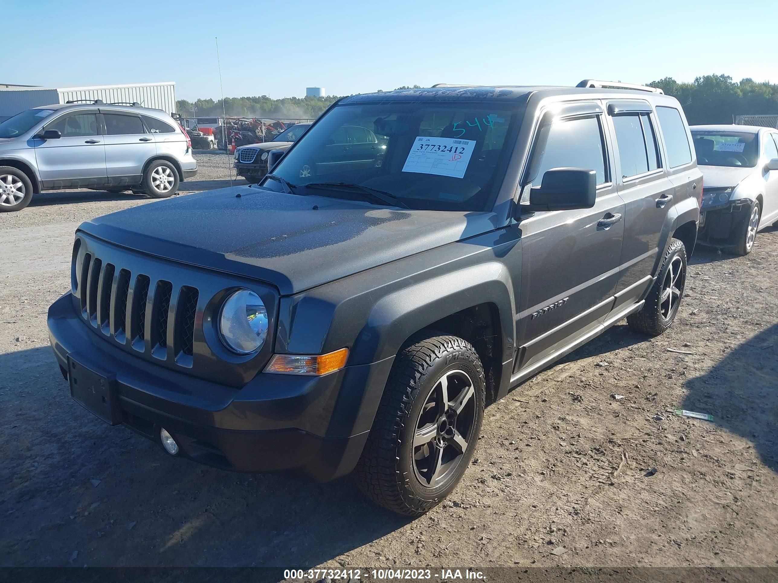 Photo 1 VIN: 1C4NJPBB5GD703154 - JEEP PATRIOT 