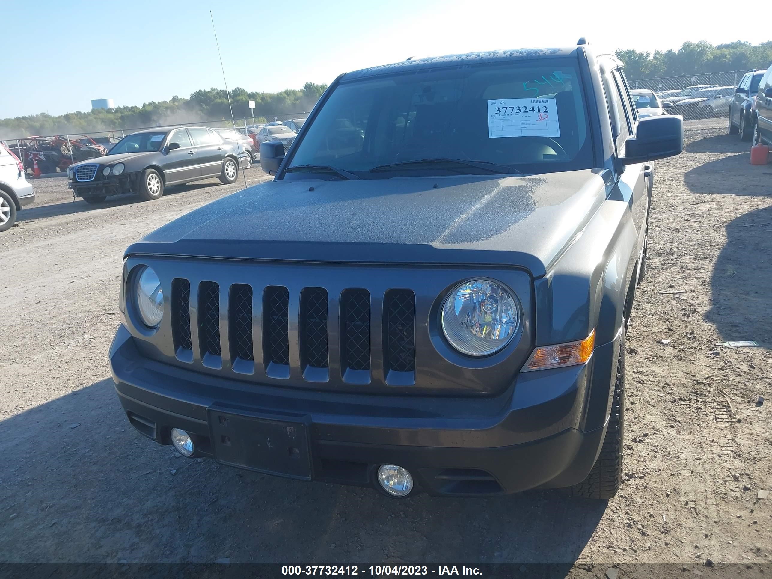 Photo 11 VIN: 1C4NJPBB5GD703154 - JEEP PATRIOT 