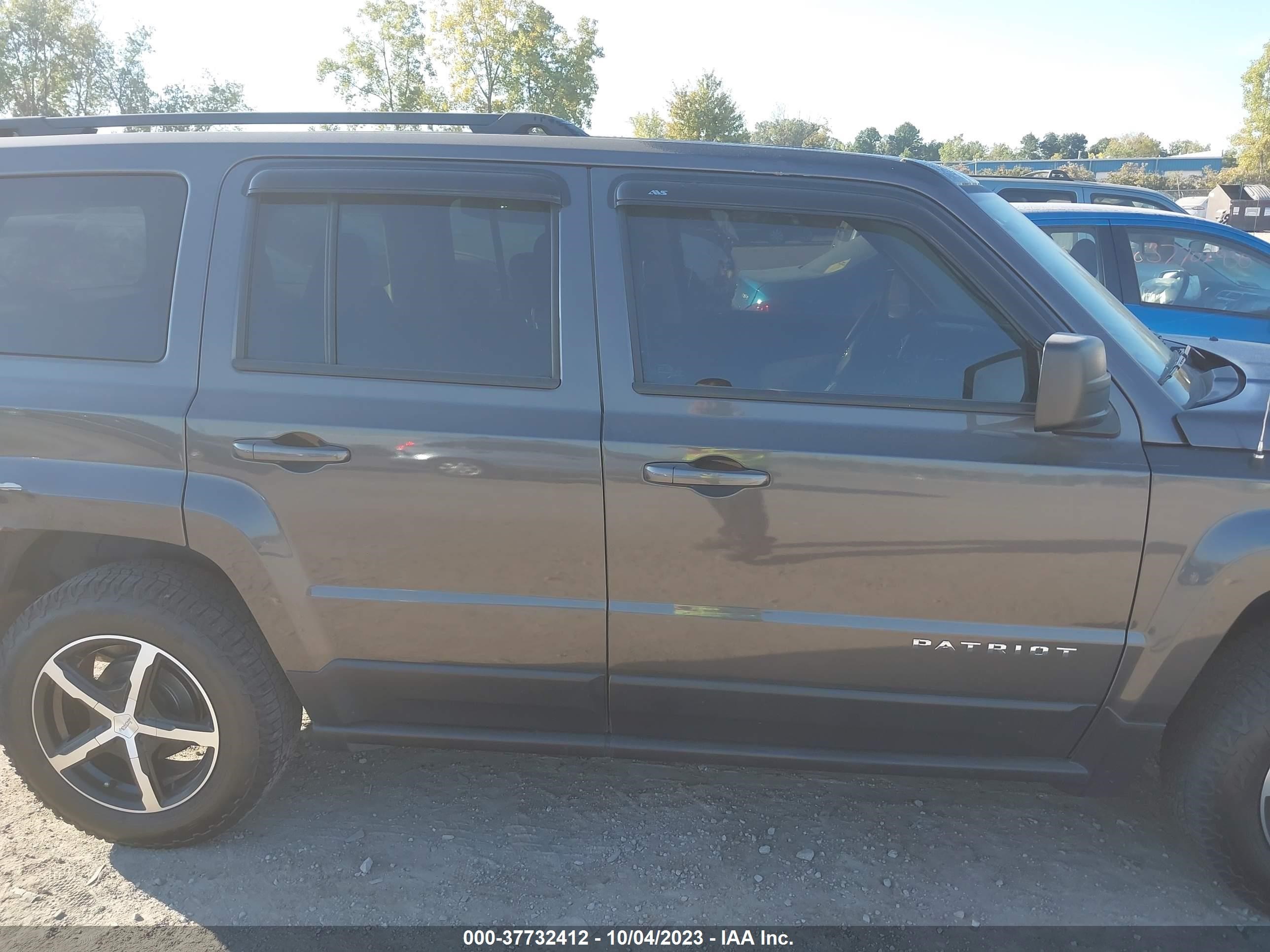 Photo 12 VIN: 1C4NJPBB5GD703154 - JEEP PATRIOT 