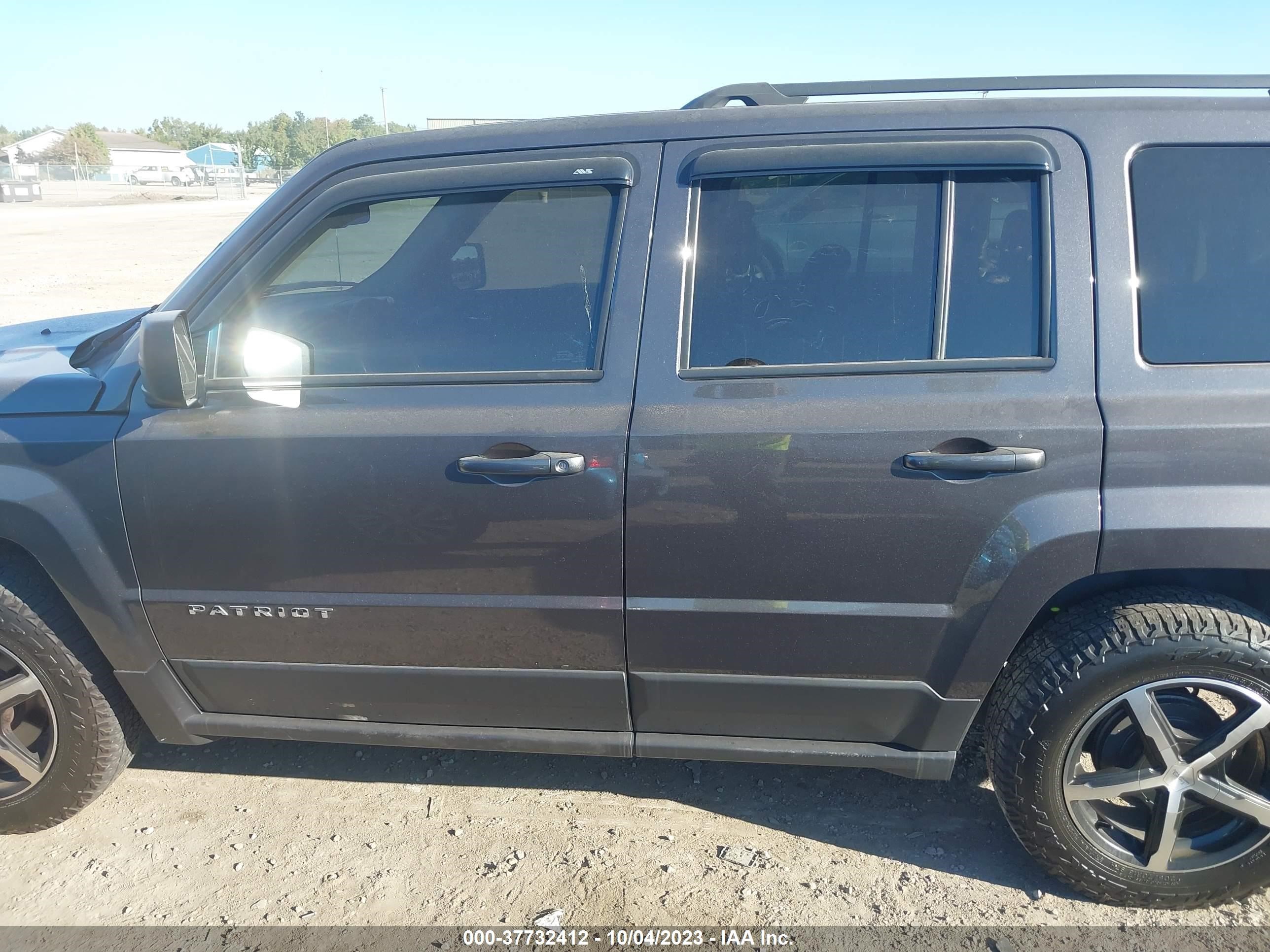 Photo 13 VIN: 1C4NJPBB5GD703154 - JEEP PATRIOT 