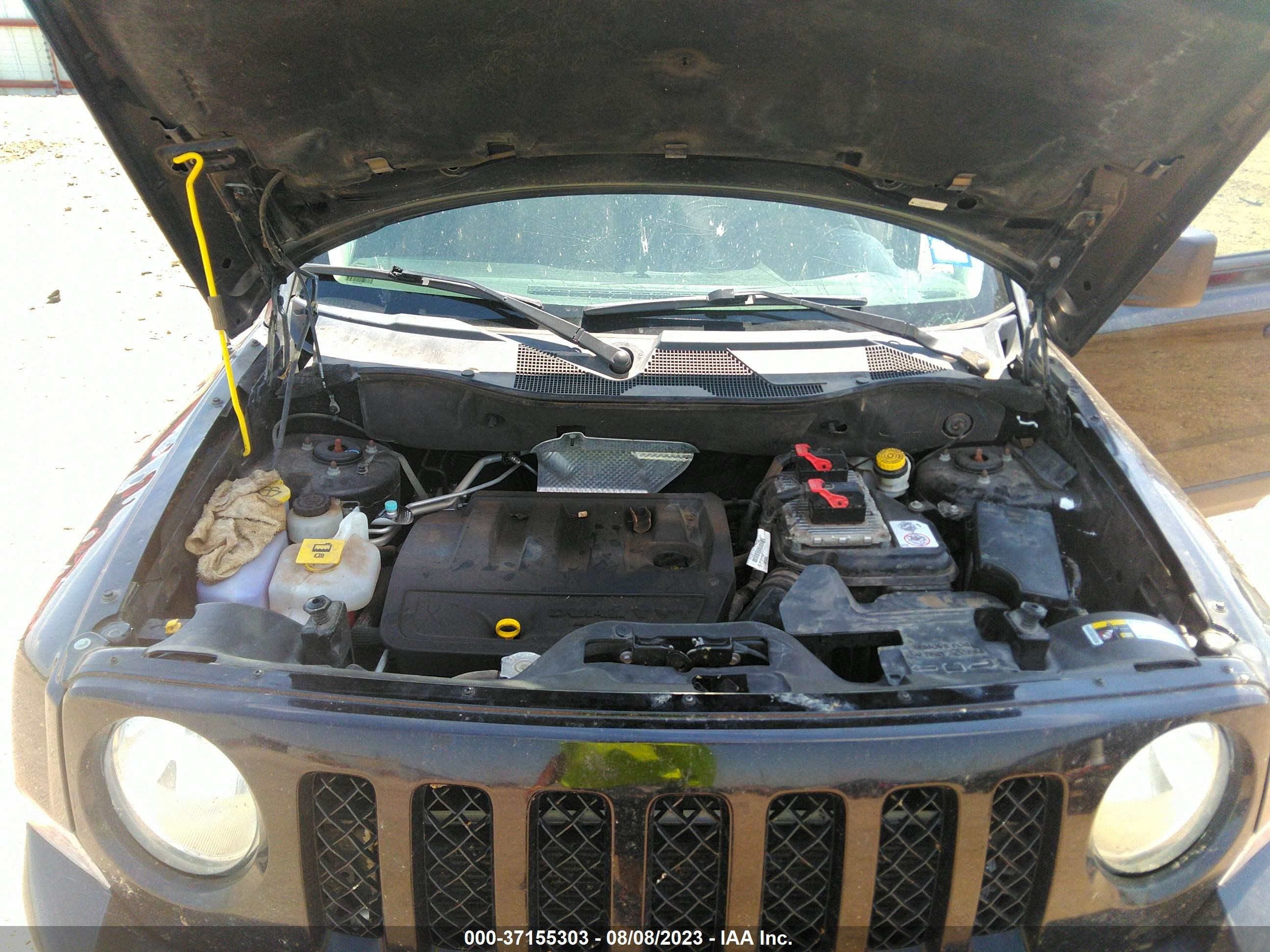 Photo 9 VIN: 1C4NJPBBXED737328 - JEEP LIBERTY (PATRIOT) 