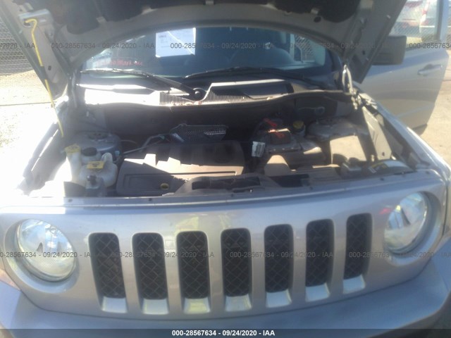 Photo 9 VIN: 1C4NJPBBXGD703117 - JEEP PATRIOT 