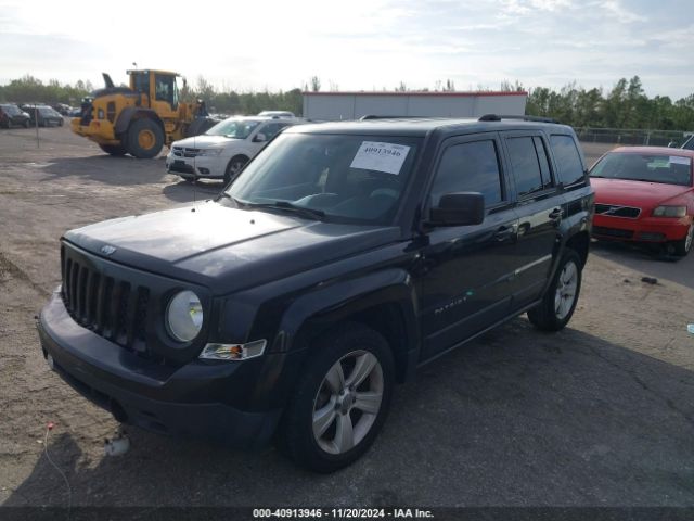 Photo 1 VIN: 1C4NJPBBXGD747716 - JEEP PATRIOT 