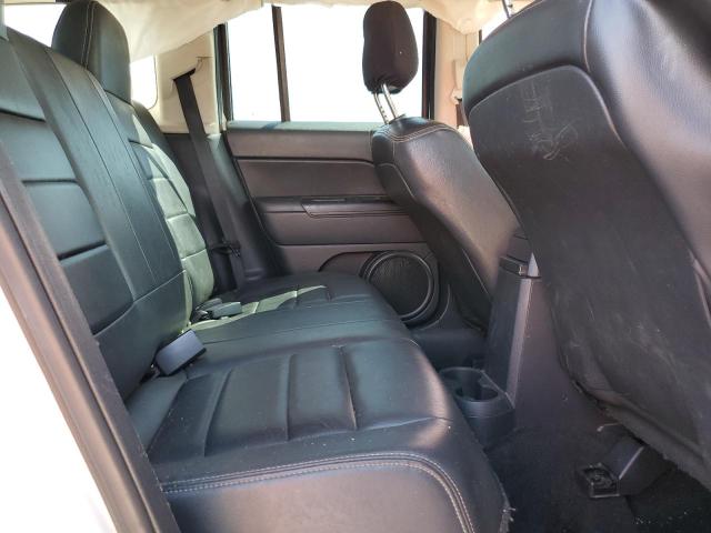 Photo 9 VIN: 1C4NJPFA2ED819006 - JEEP PATRIOT LA 