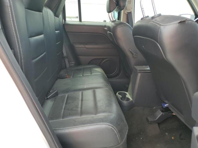 Photo 9 VIN: 1C4NJPFA4GD659830 - JEEP PATRIOT LA 