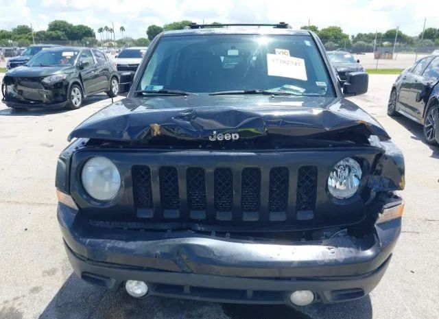 Photo 5 VIN: 1C4NJPFBXED814659 - JEEP LIBERTY (PATRIOT) 