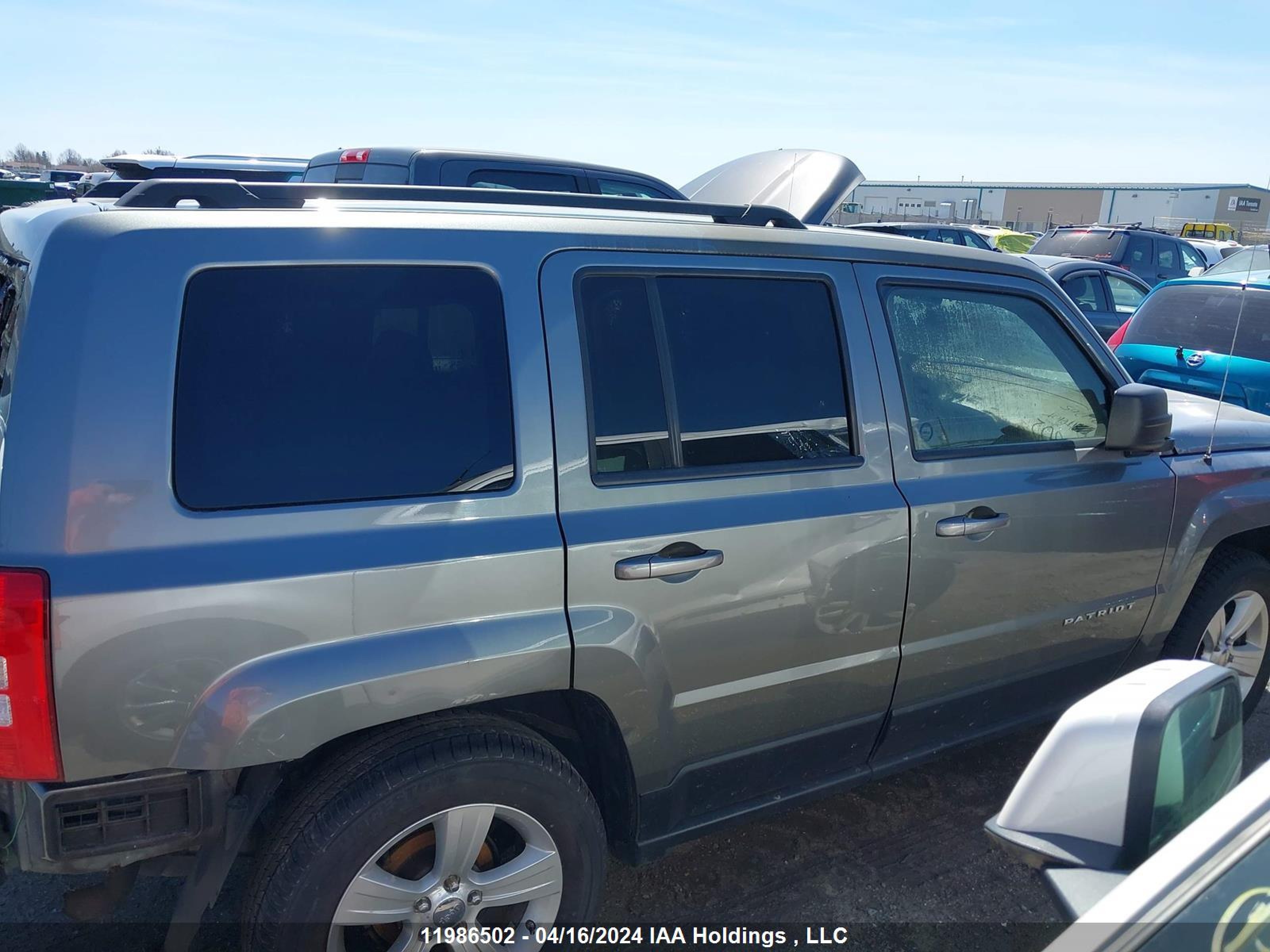 Photo 13 VIN: 1C4NJRAB8CD594065 - JEEP LIBERTY (PATRIOT) 