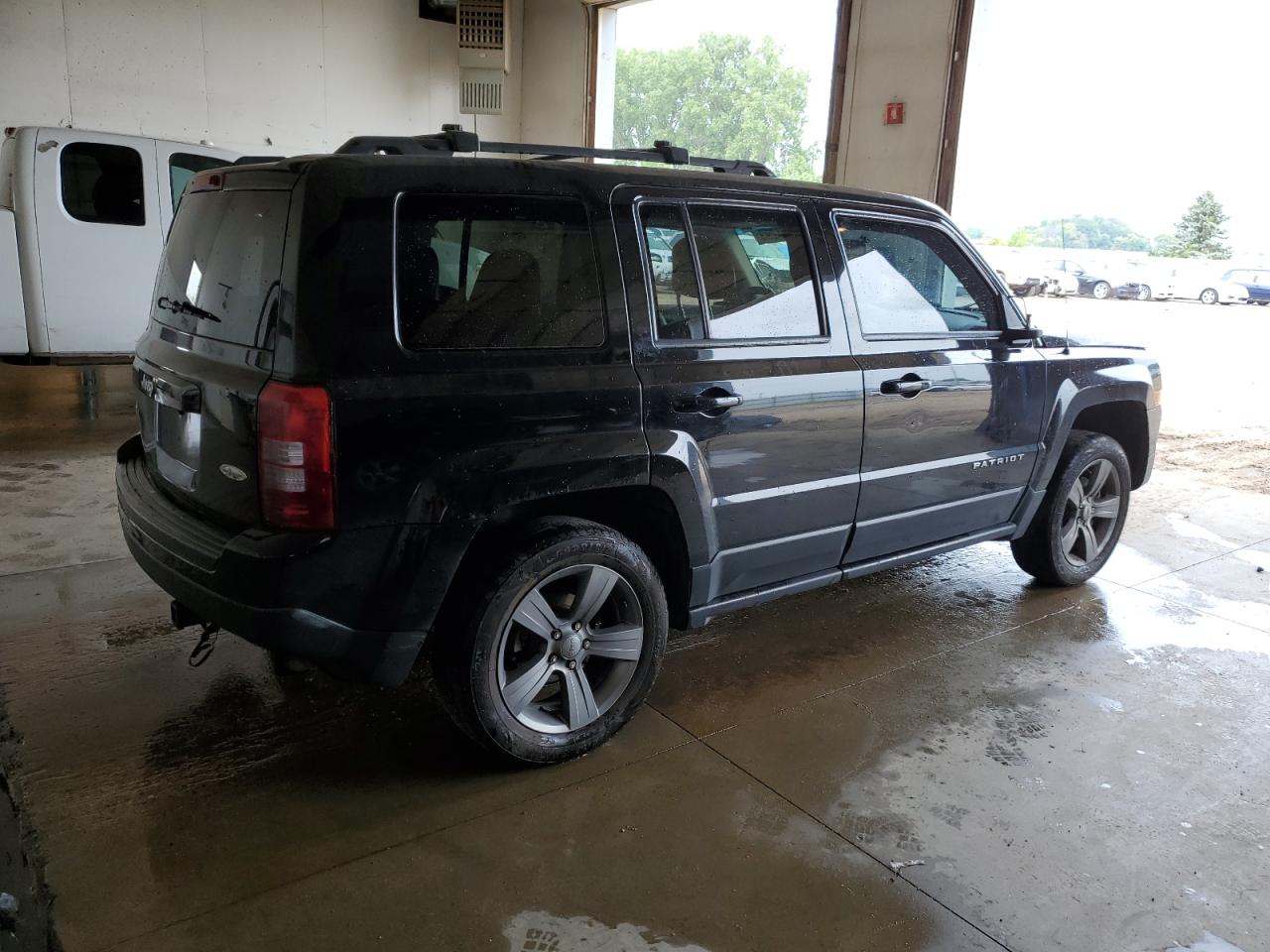 Photo 2 VIN: 1C4NJRAB9FD244531 - JEEP LIBERTY (PATRIOT) 