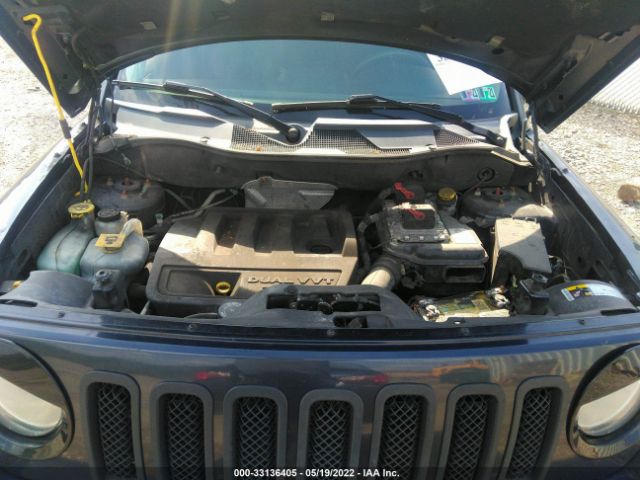 Photo 9 VIN: 1C4NJRBB1ED572281 - JEEP PATRIOT 