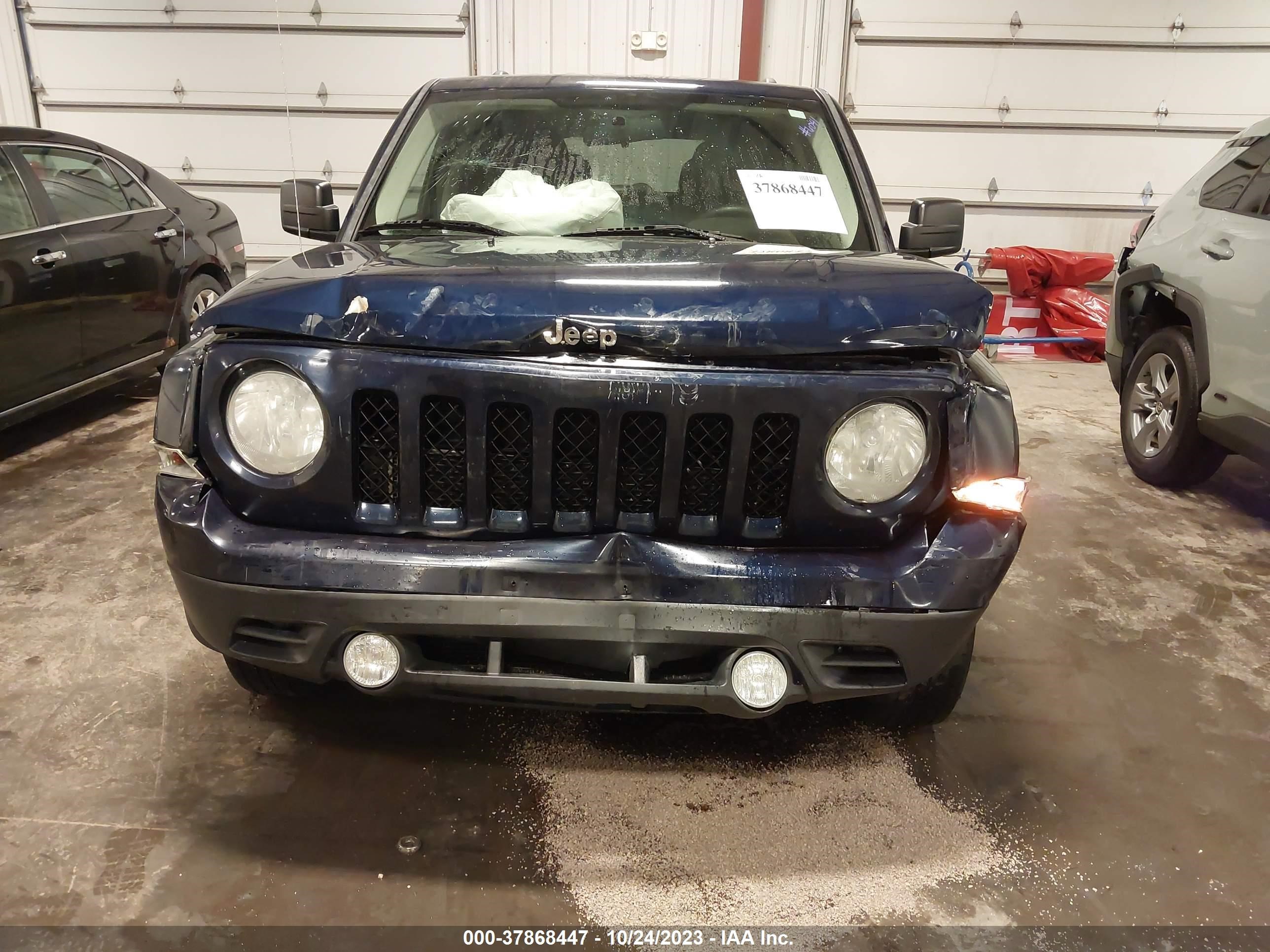 Photo 11 VIN: 1C4NJRBB3ED879385 - JEEP LIBERTY (PATRIOT) 