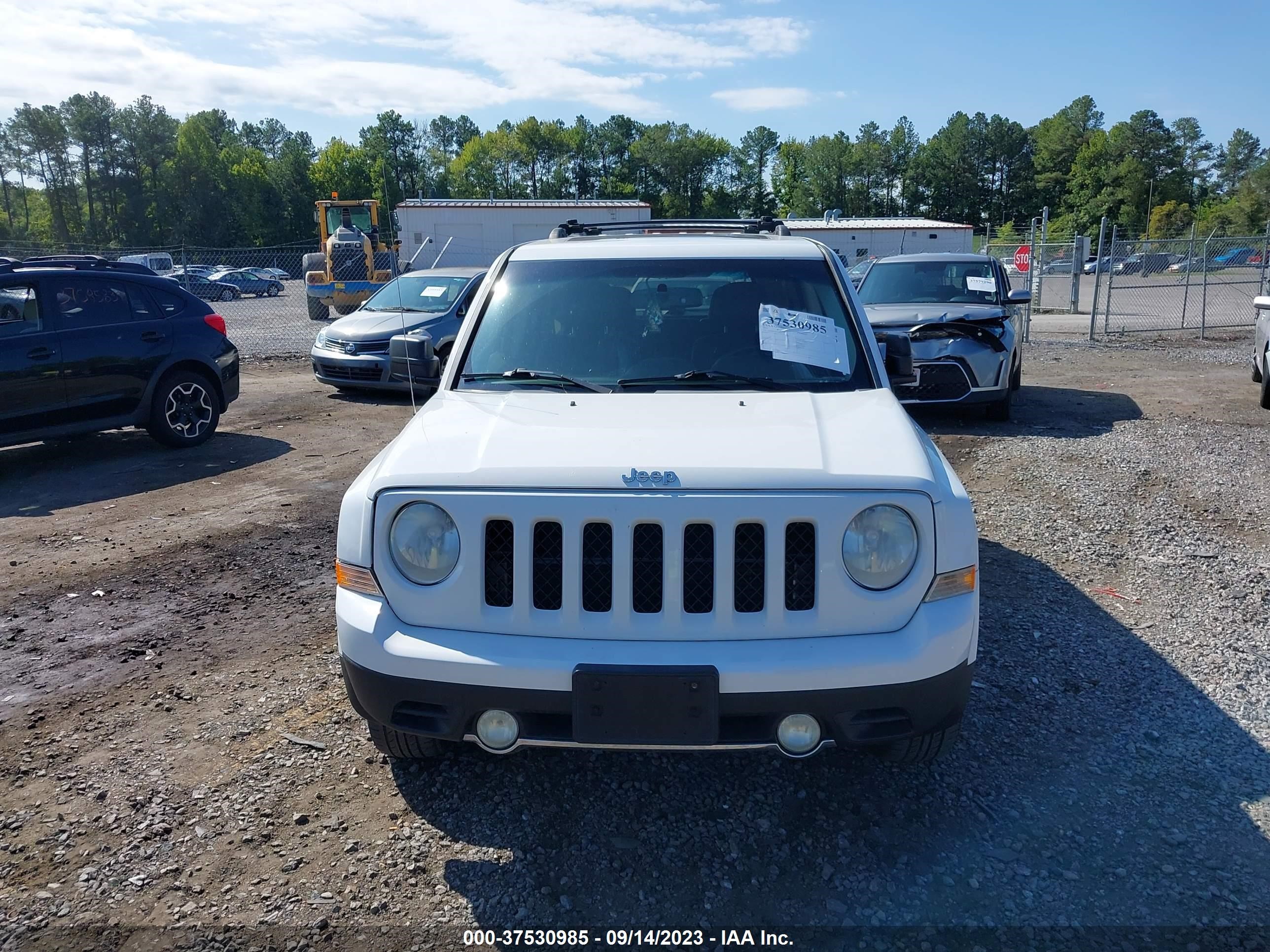 Photo 11 VIN: 1C4NJRCB3CD650751 - JEEP LIBERTY (PATRIOT) 