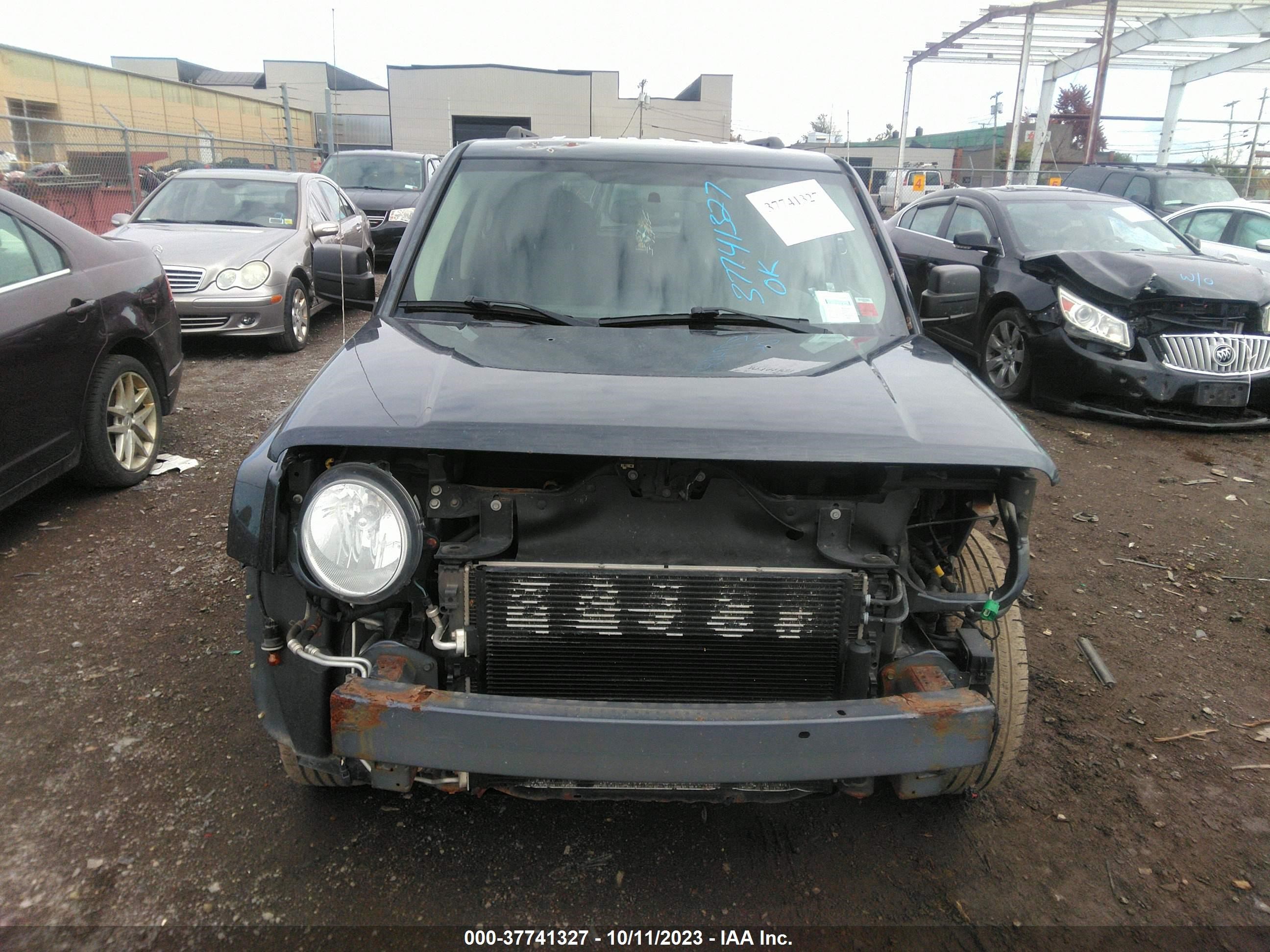 Photo 11 VIN: 1C4NJRFB5ED810336 - JEEP PATRIOT 