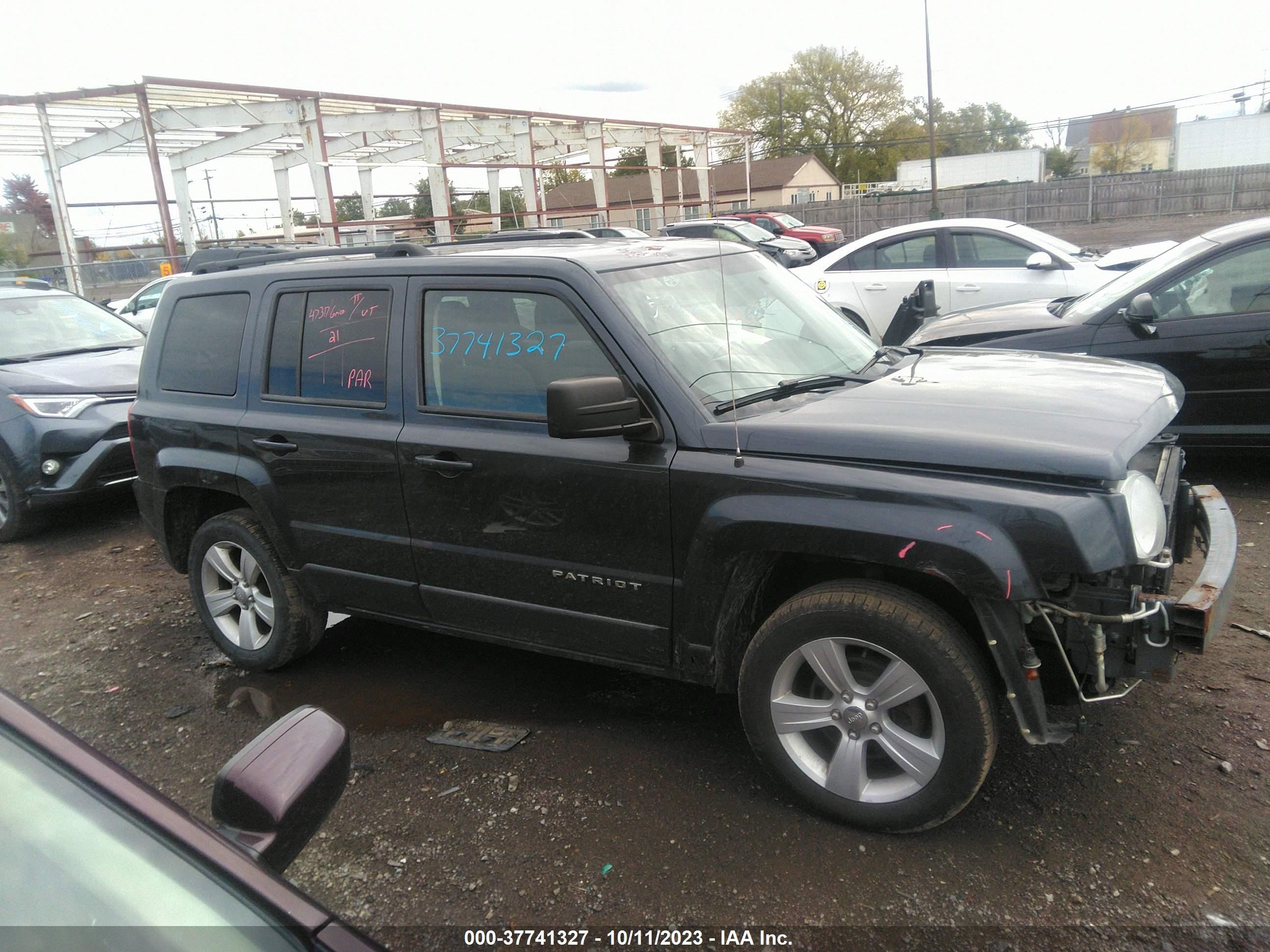 Photo 12 VIN: 1C4NJRFB5ED810336 - JEEP PATRIOT 