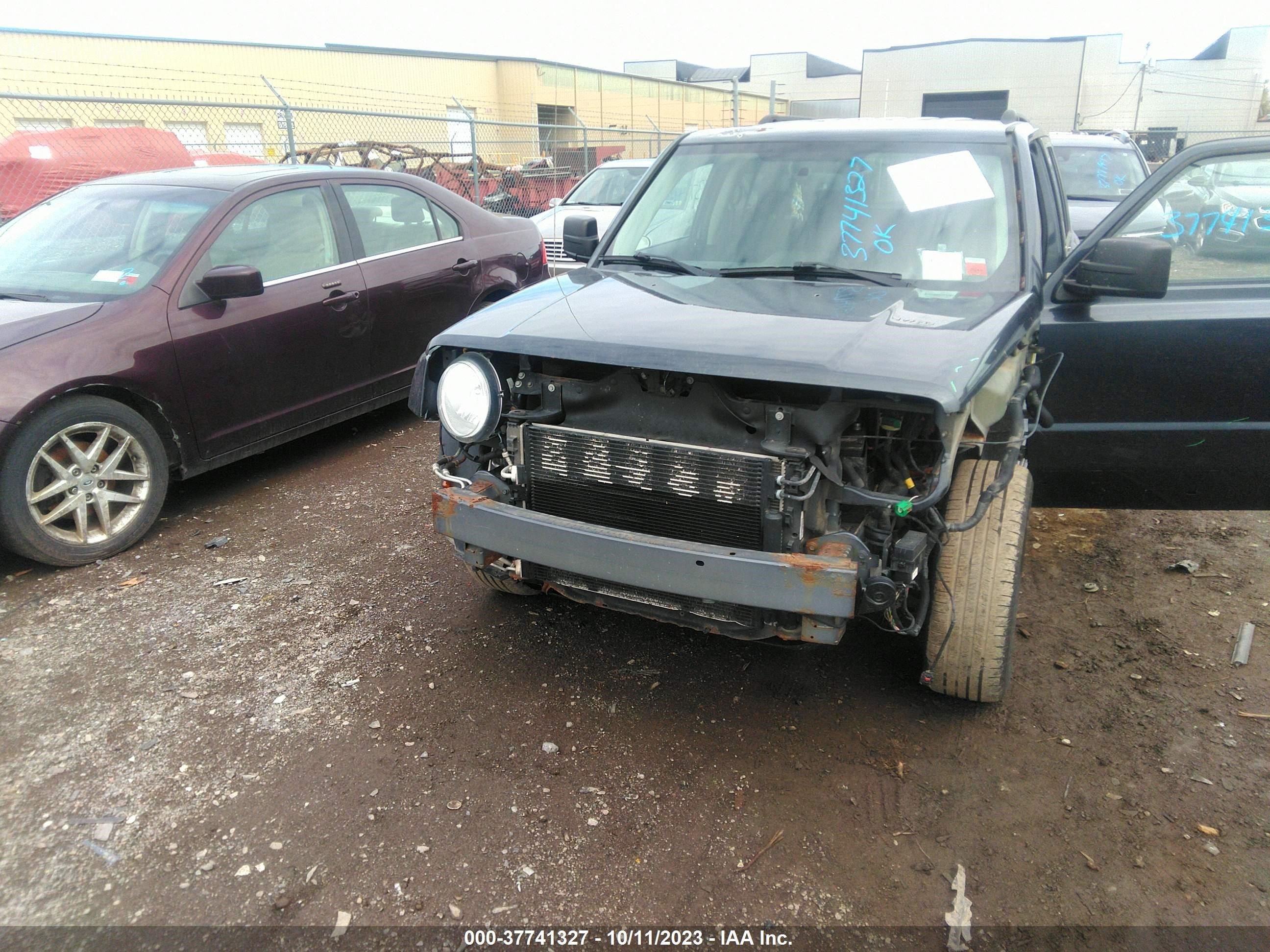 Photo 5 VIN: 1C4NJRFB5ED810336 - JEEP PATRIOT 