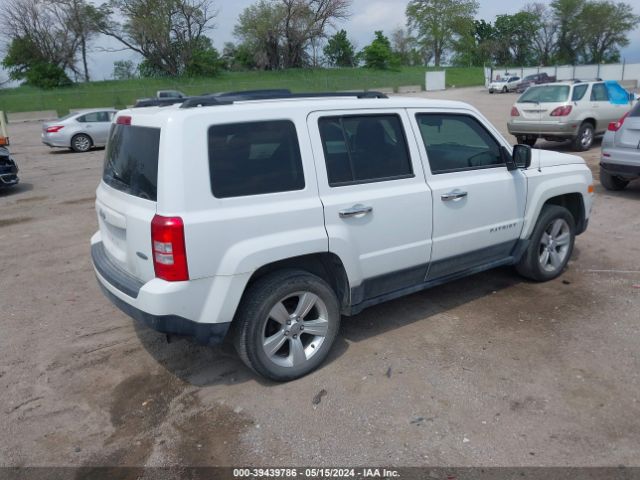 Photo 3 VIN: 1C4NJRFB7ED664571 - JEEP PATRIOT 