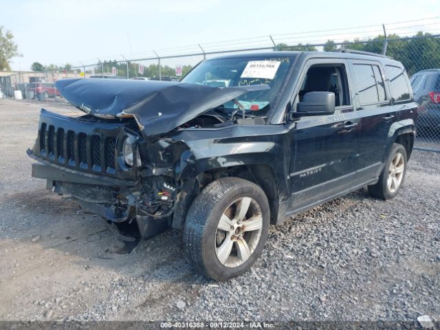 Photo 1 VIN: 1C4NJRFBXGD650909 - JEEP PATRIOT 