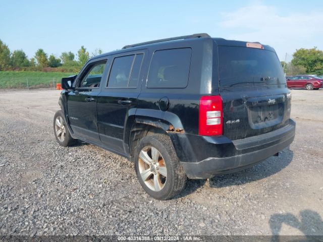 Photo 2 VIN: 1C4NJRFBXGD650909 - JEEP PATRIOT 