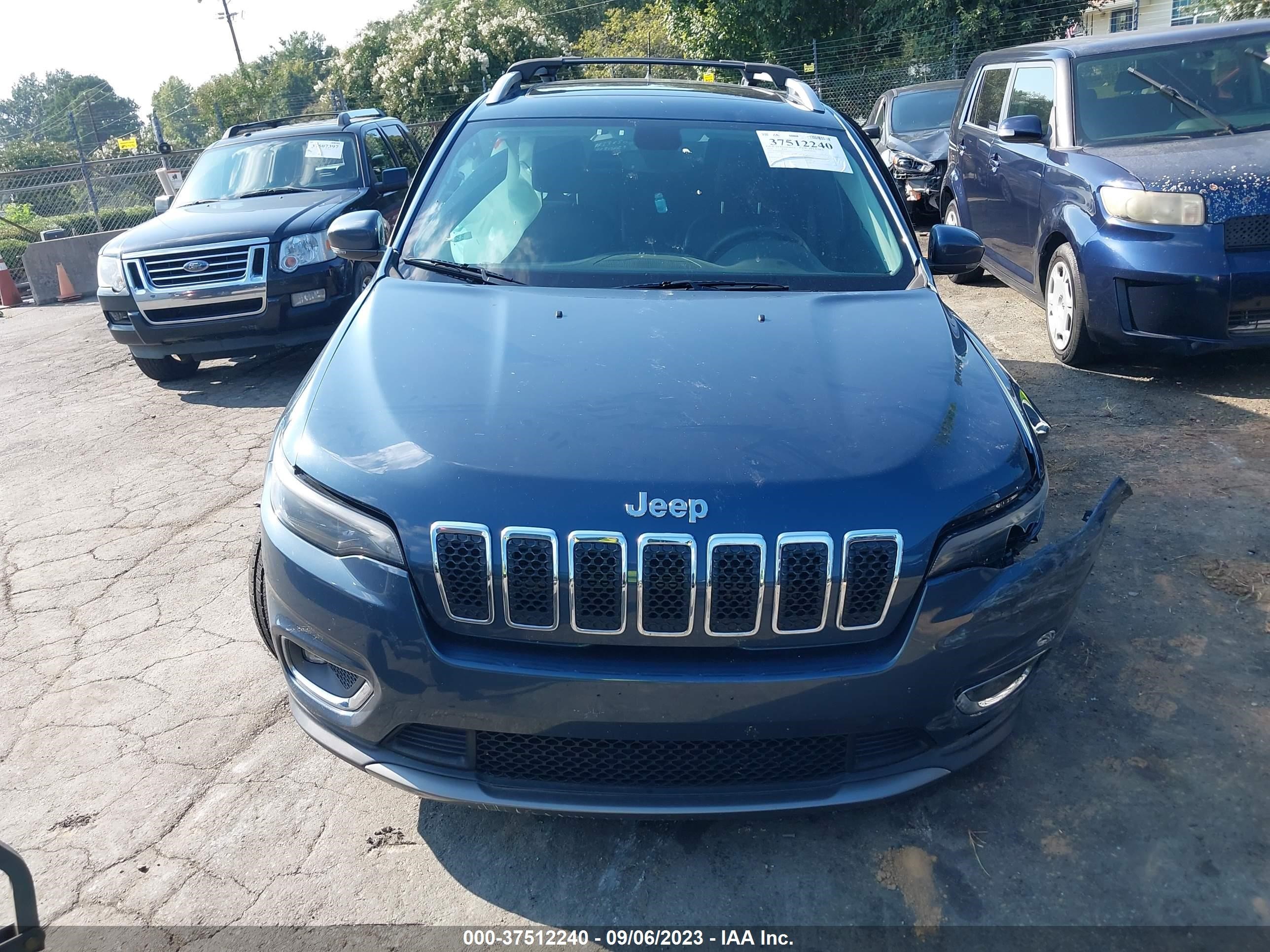 Photo 11 VIN: 1C4PJMDX3KD356450 - JEEP CHEROKEE 