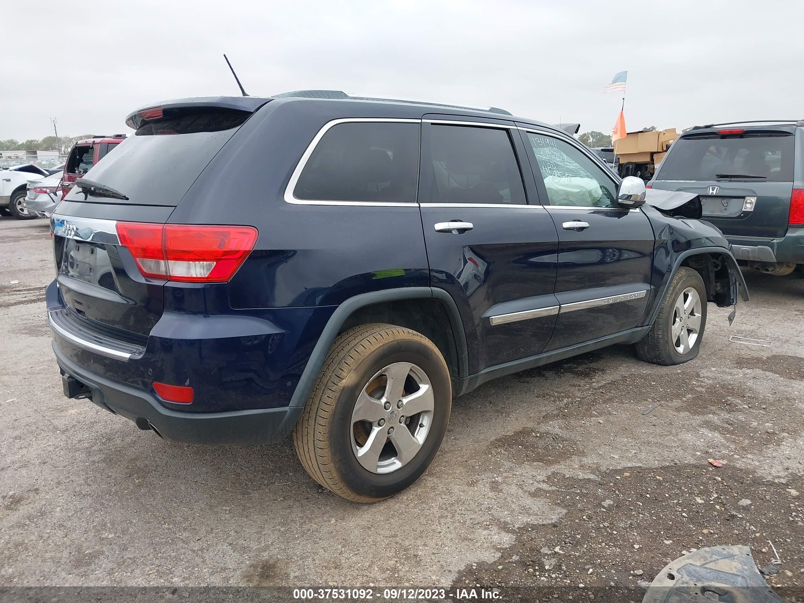 Photo 3 VIN: 1C4RJEBT8CC260495 - JEEP GRAND CHEROKEE 