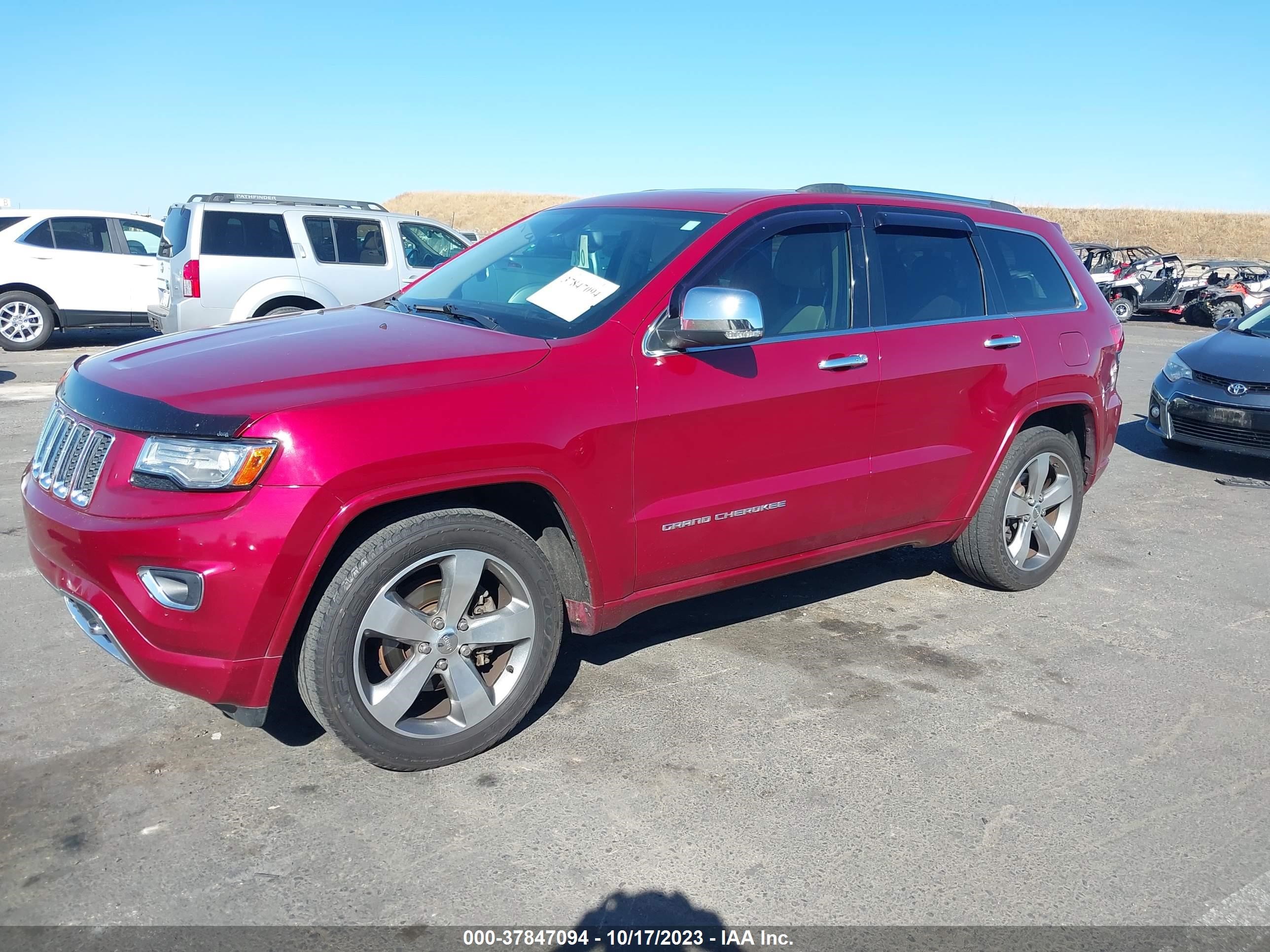 Photo 1 VIN: 1C4RJECG9EC410134 - JEEP GRAND CHEROKEE 