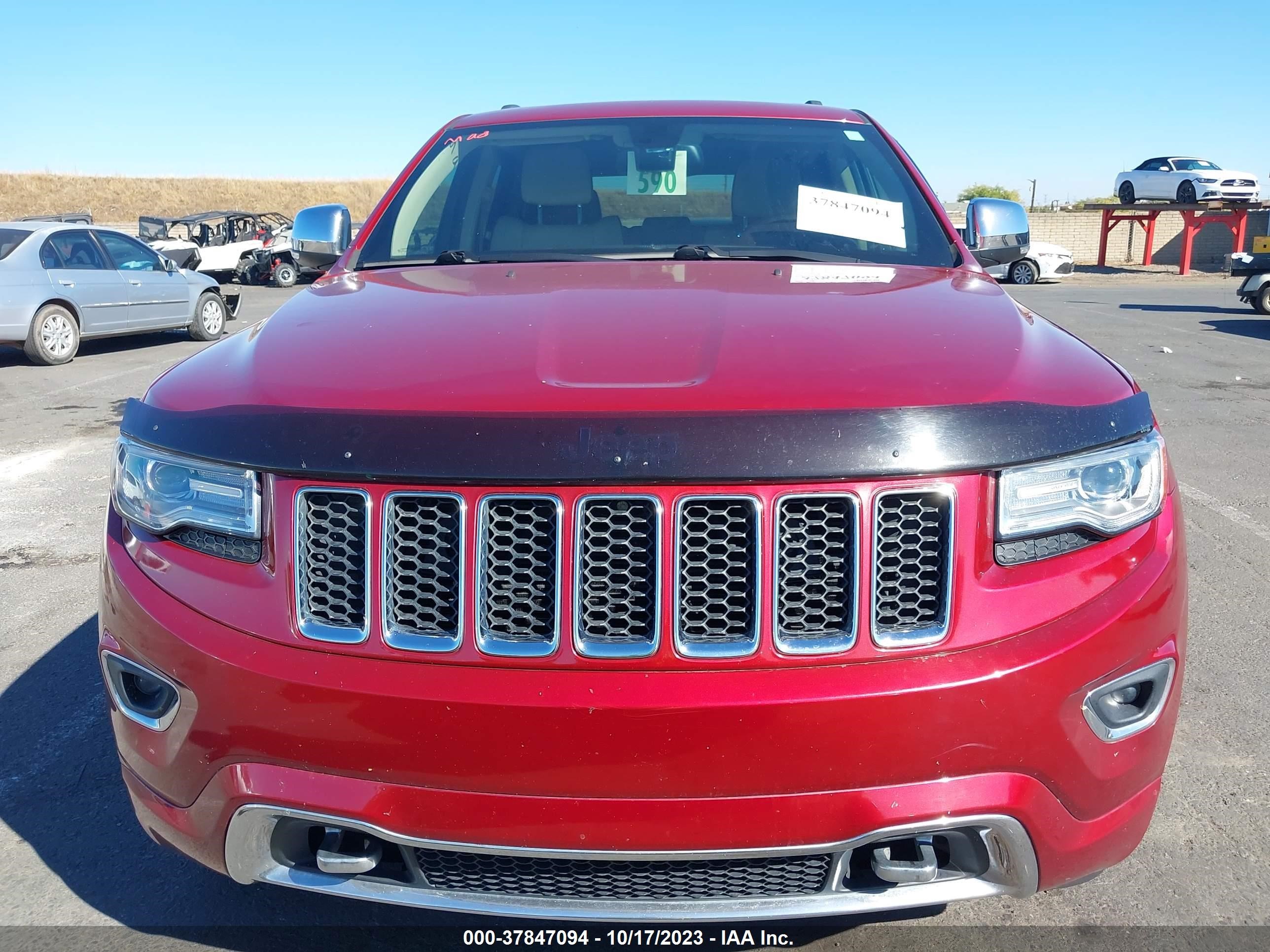 Photo 11 VIN: 1C4RJECG9EC410134 - JEEP GRAND CHEROKEE 