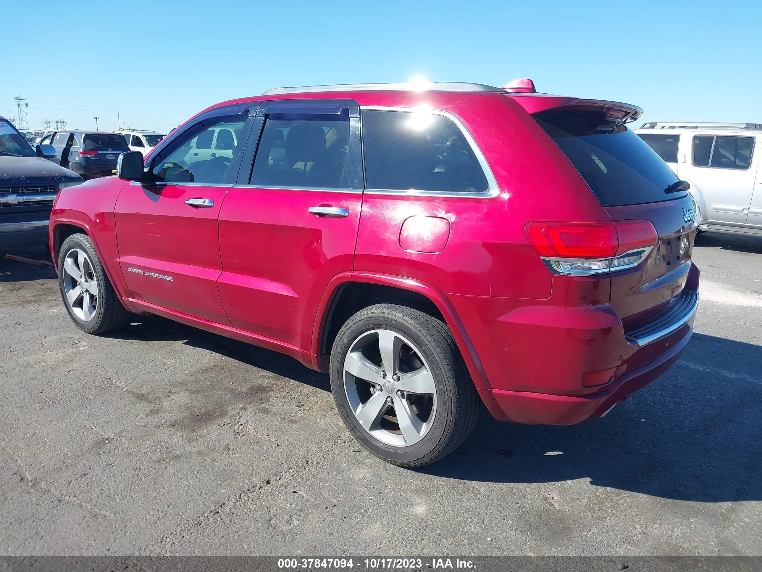 Photo 2 VIN: 1C4RJECG9EC410134 - JEEP GRAND CHEROKEE 