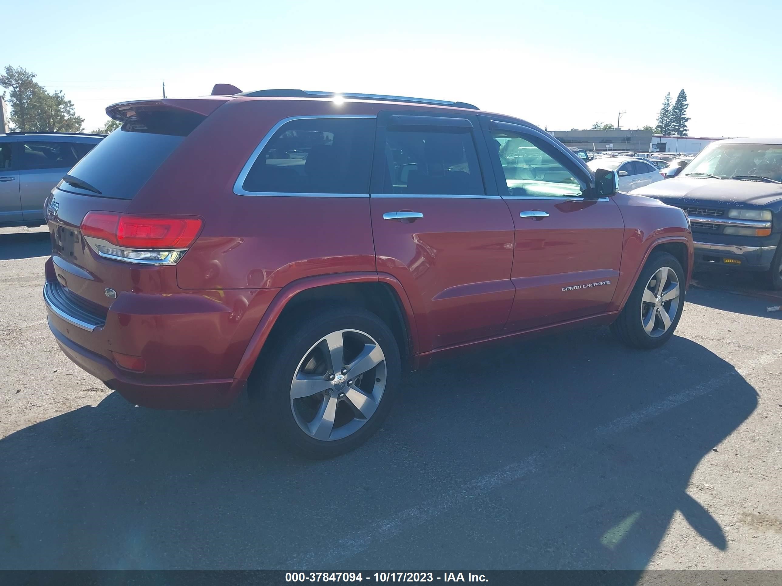 Photo 3 VIN: 1C4RJECG9EC410134 - JEEP GRAND CHEROKEE 