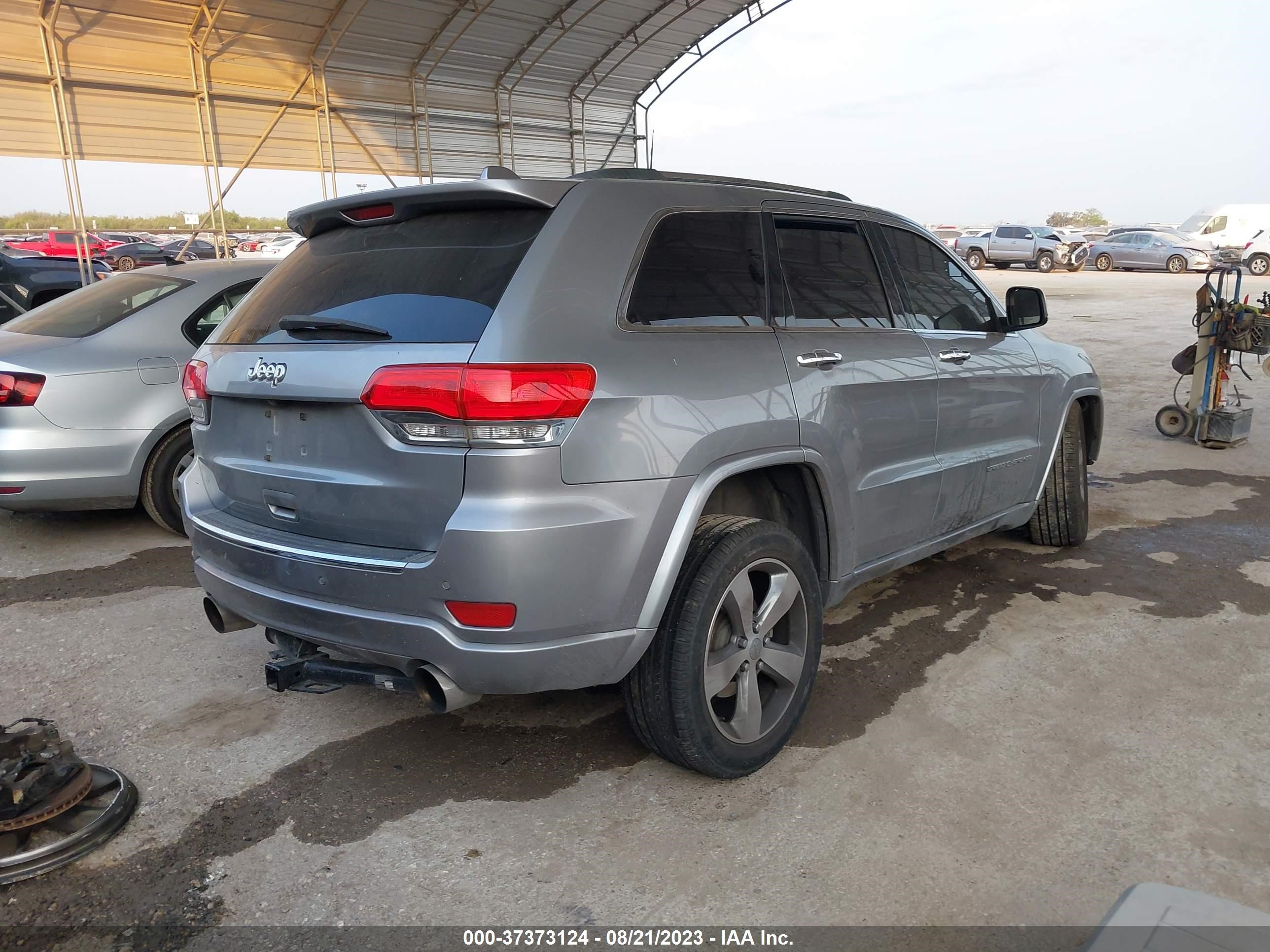 Photo 3 VIN: 1C4RJECT5EC240142 - JEEP GRAND CHEROKEE 